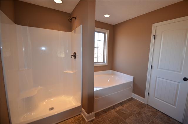 126 Legends Ridge Drive, Unit 20 Lebanon, TN 37090 - Photo 9 of 15 Master bath with garden tub and separate shower