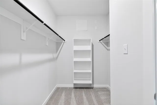 a view of an empty walk in closet