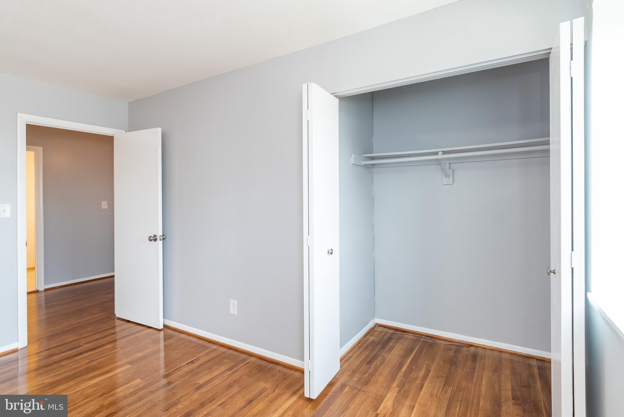 37 Cardor Court, Unit 37 Baltimore, MD 21236 - Photo 25 of 47 a view of an empty room with wooden floor