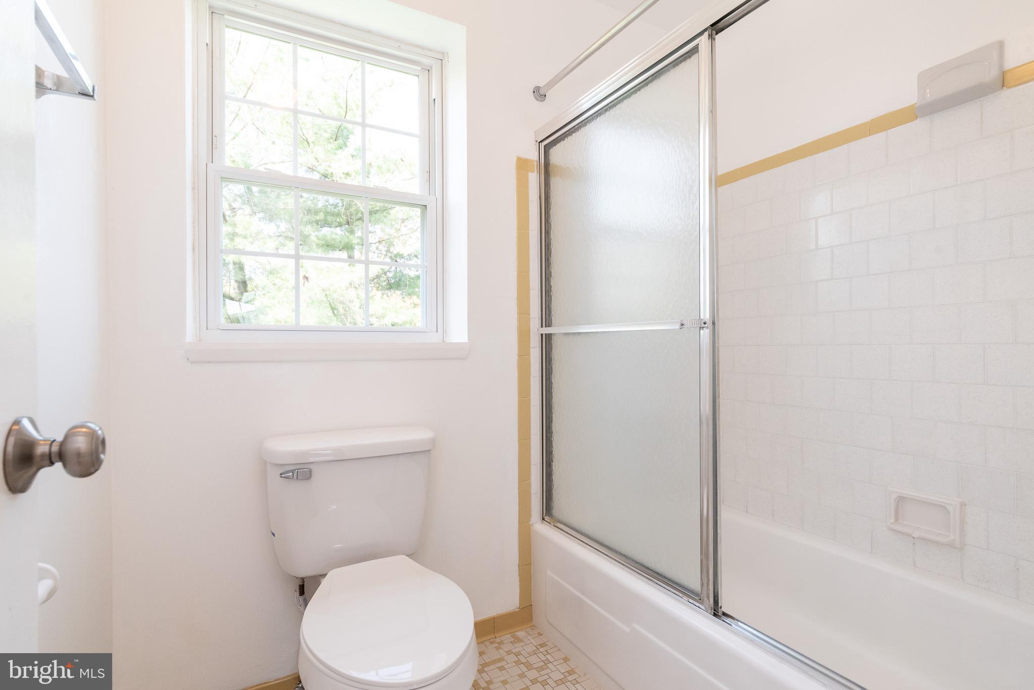 37 Cardor Court, Unit 37 Baltimore, MD 21236 - Photo 27 of 47 a bathroom with a toilet and a shower