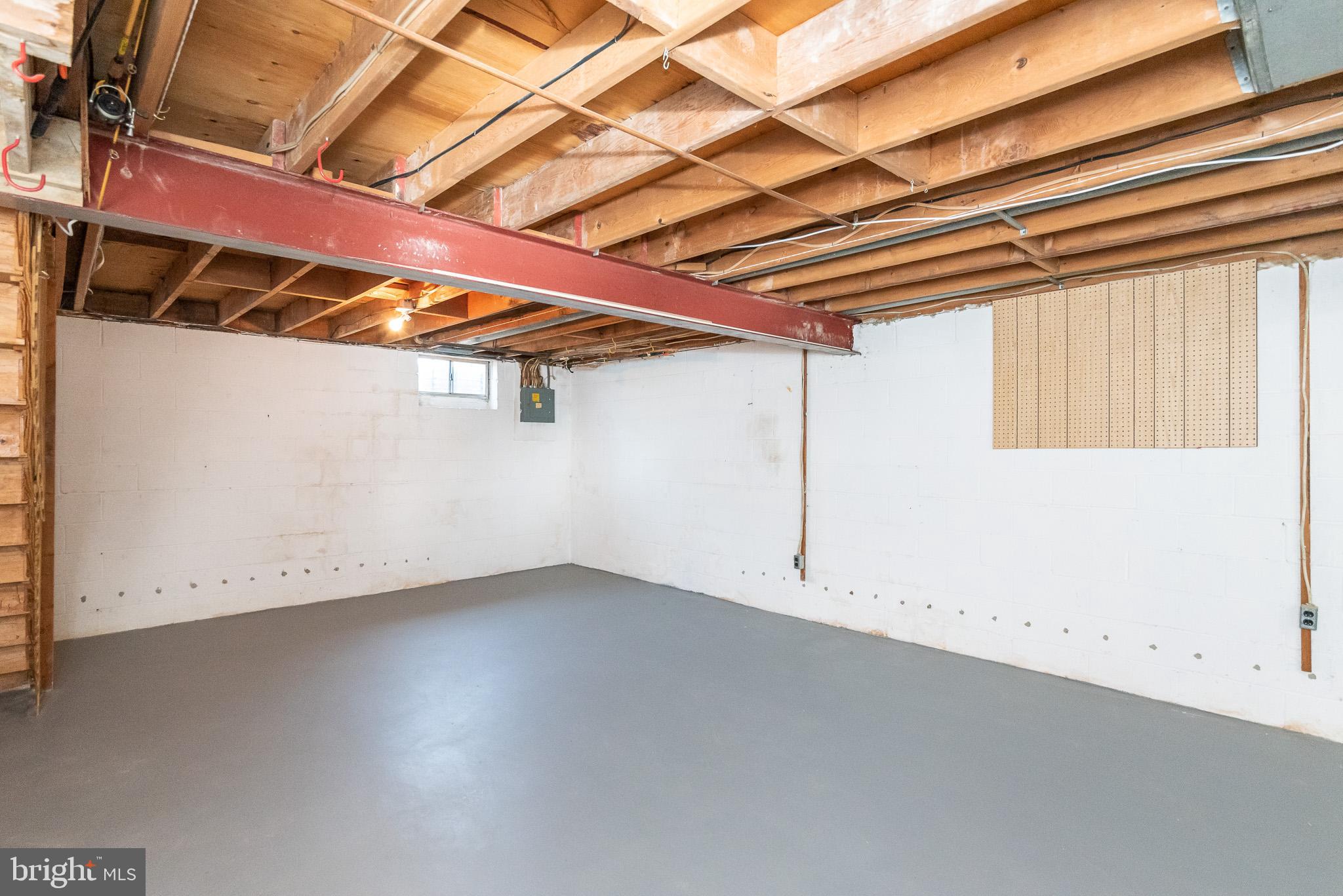 37 Cardor Court, Unit 37 Baltimore, MD 21236 - Photo 37 of 47 a view of a room with wooden walls and a window