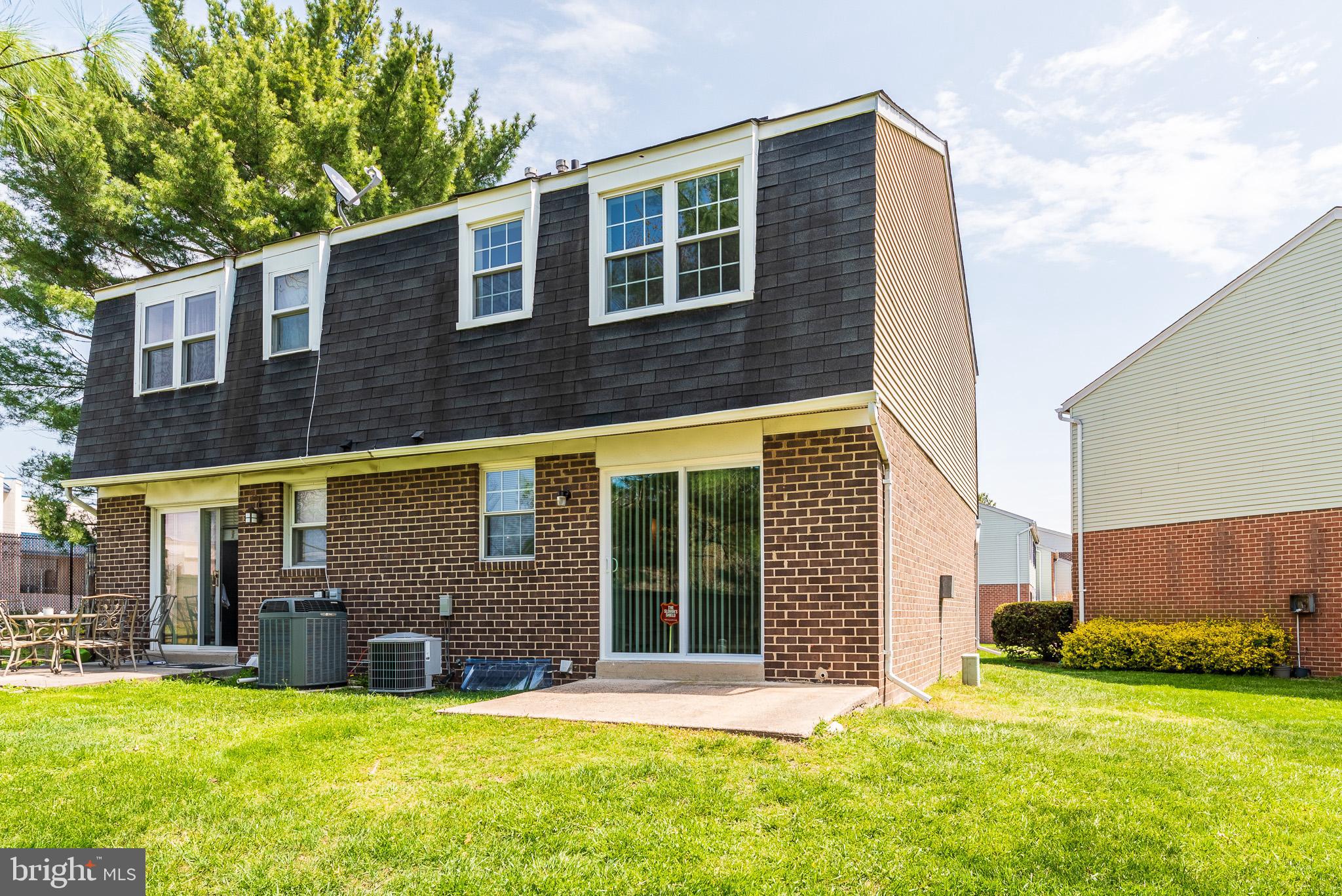 37 Cardor Court, Unit 37 Baltimore, MD 21236 - Photo 40 of 47 a view of a house with a yard and large tree