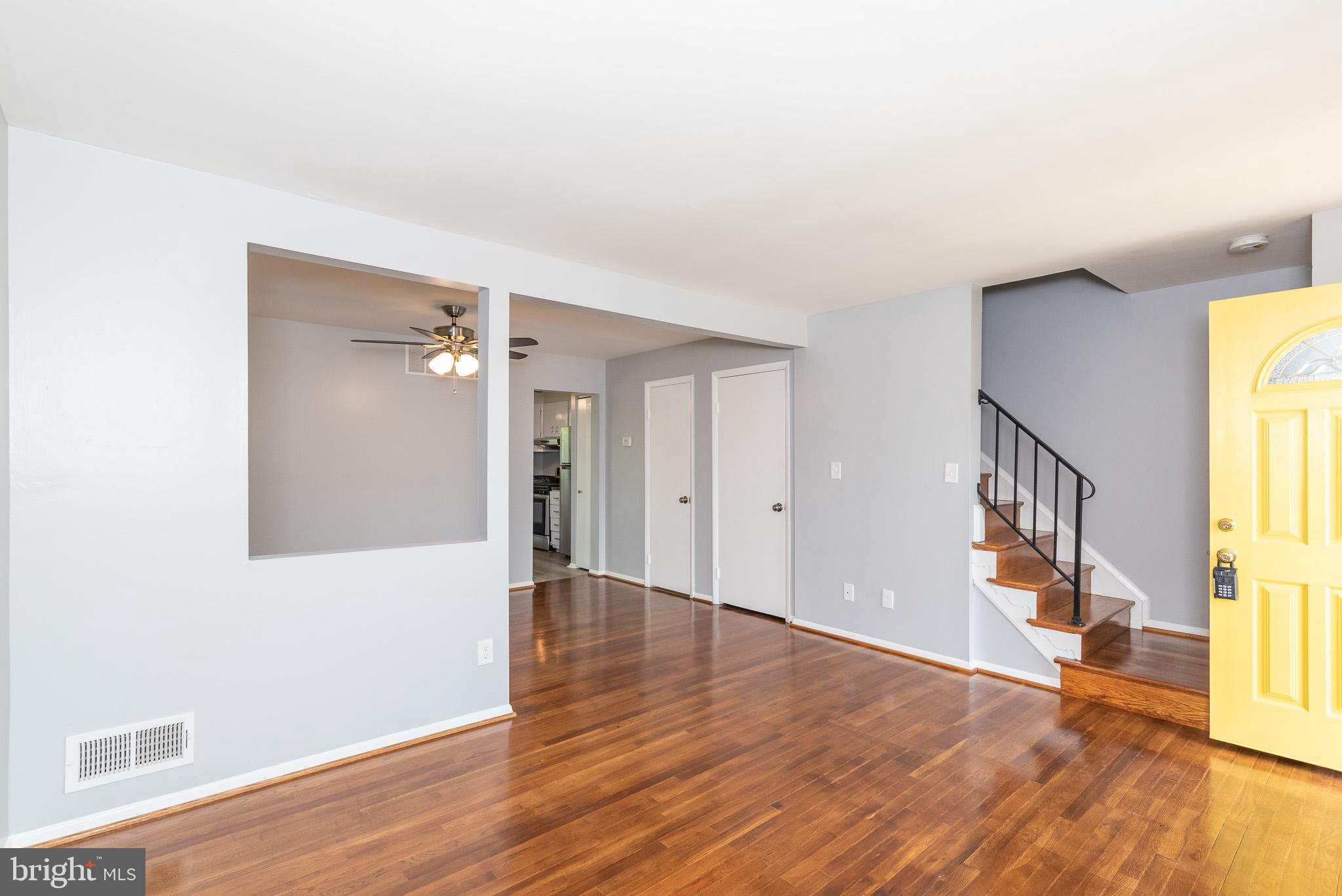 37 Cardor Court, Unit 37 Baltimore, MD 21236 - Photo 4 of 47 a view of an empty room with wooden floor and a window