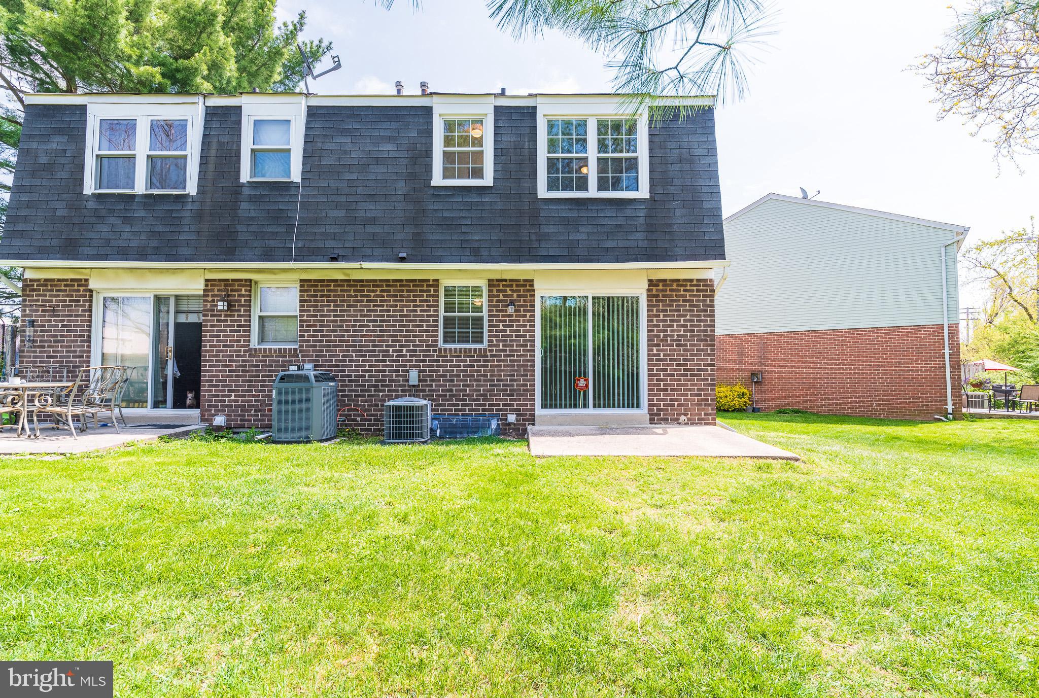37 Cardor Court, Unit 37 Baltimore, MD 21236 - Photo 41 of 47 a view of a house with a yard and a large tree