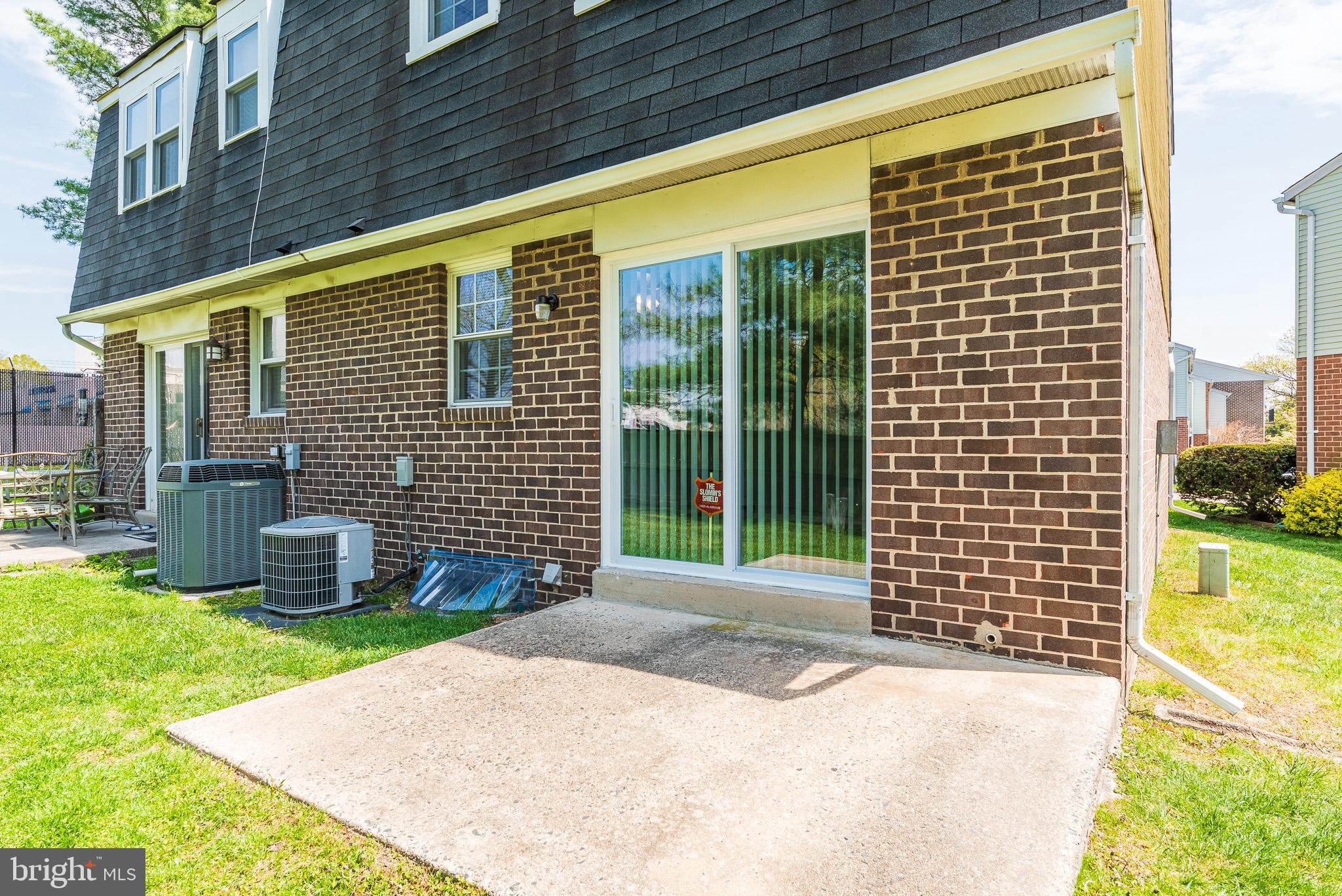 37 Cardor Court, Unit 37 Baltimore, MD 21236 - Photo 42 of 47 a backyard of a house with seating space