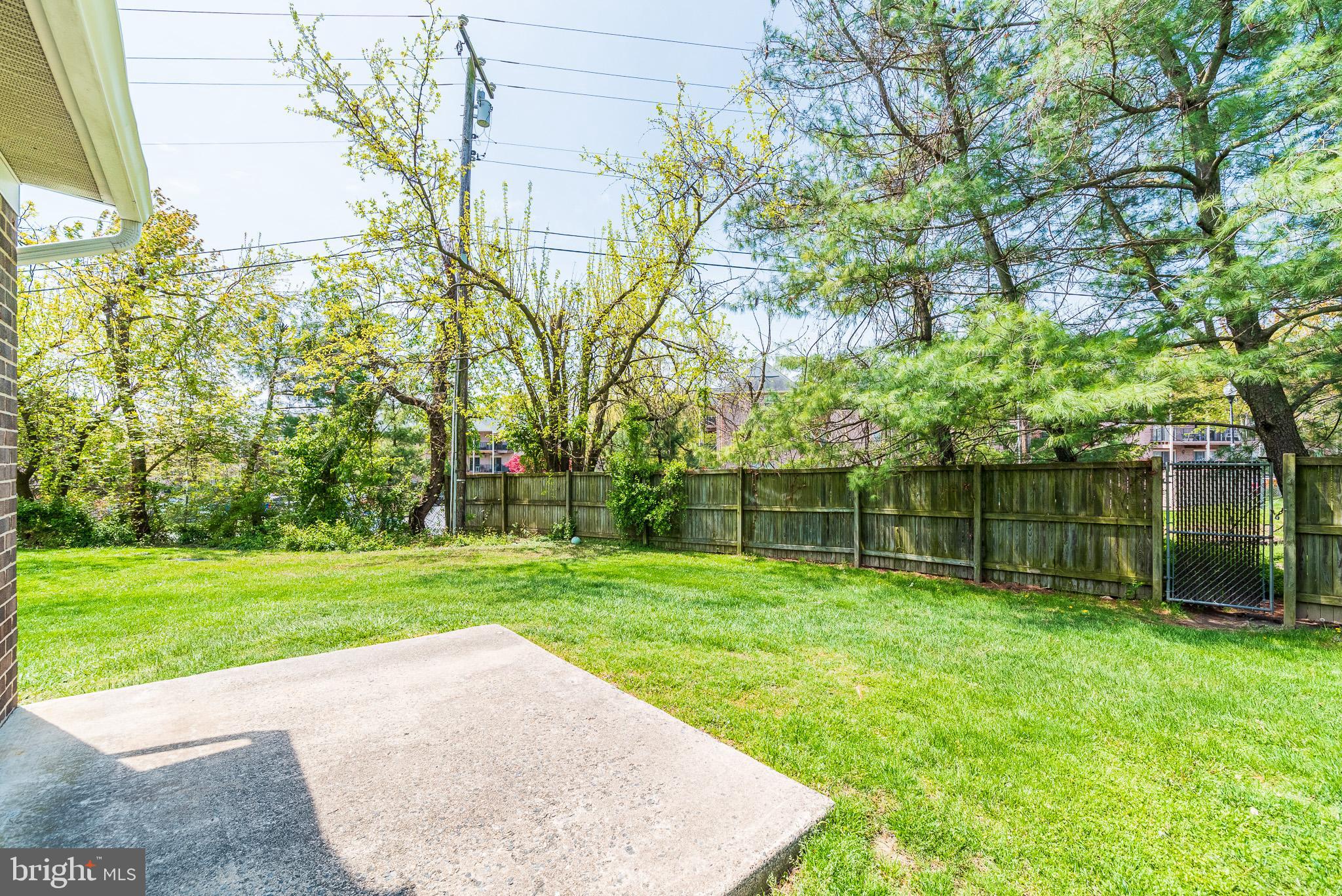 37 Cardor Court, Unit 37 Baltimore, MD 21236 - Photo 43 of 47 a backyard of a house and trees