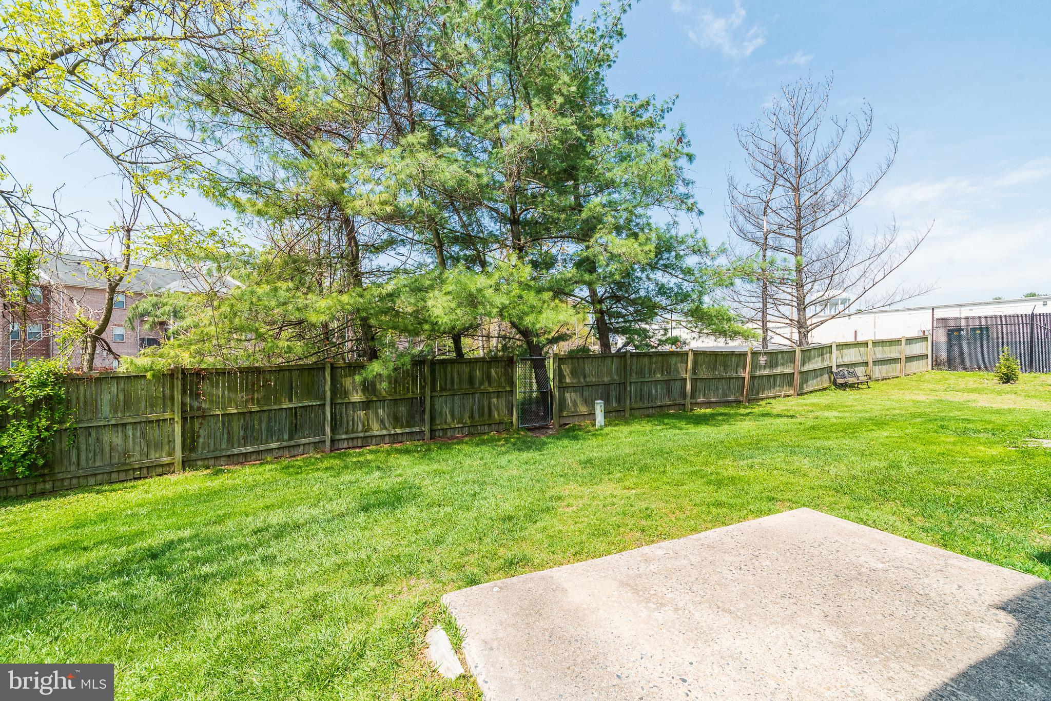 37 Cardor Court, Unit 37 Baltimore, MD 21236 - Photo 44 of 47 a backyard of a house with lots of green space