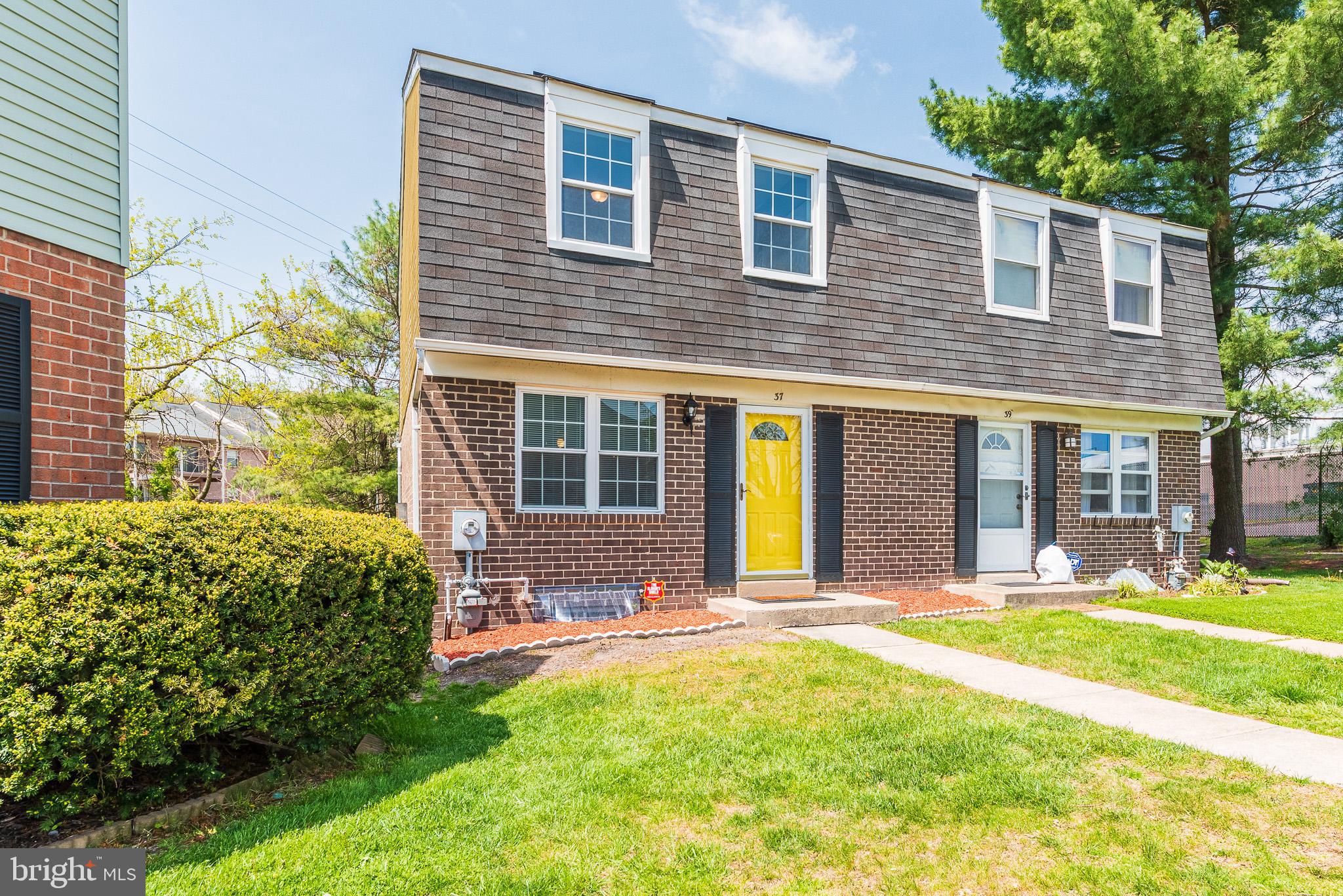 37 Cardor Court, Unit 37 Baltimore, MD 21236 - Photo 46 of 47 a front view of a house with a yard