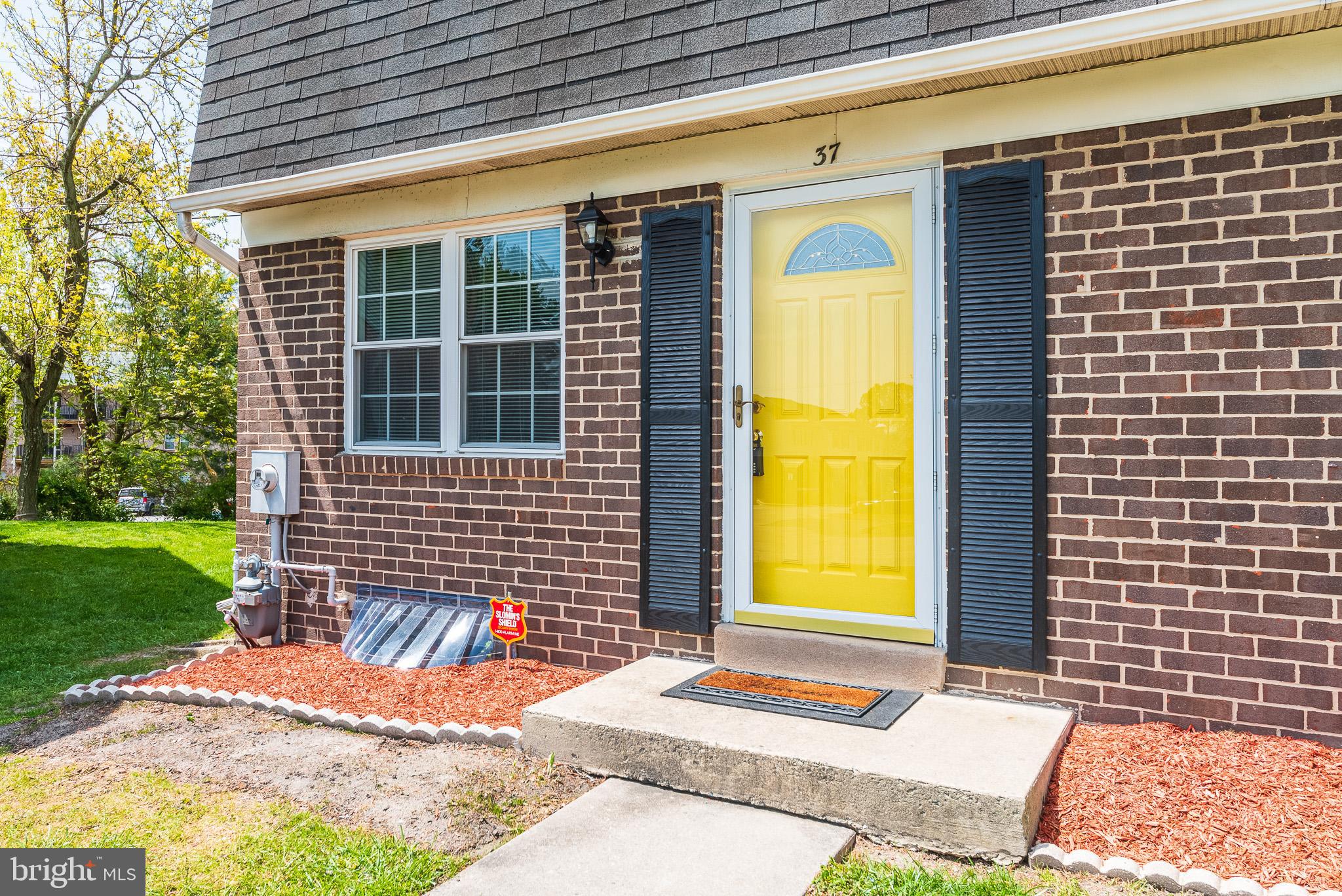 37 Cardor Court, Unit 37 Baltimore, MD 21236 - Photo 47 of 47 a front view of a house with a yard