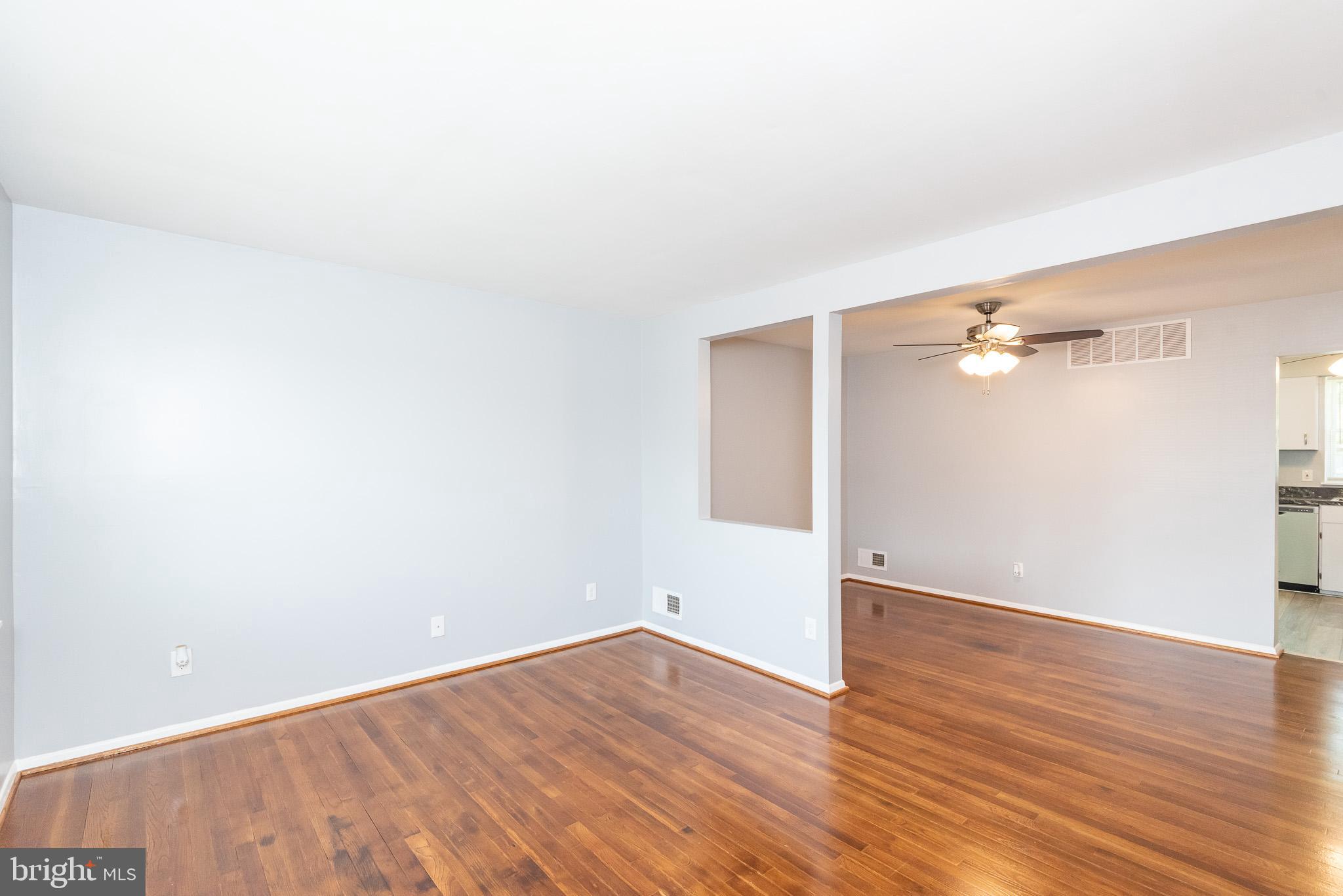 37 Cardor Court, Unit 37 Baltimore, MD 21236 - Photo 5 of 47 a view of an empty room with wooden floor