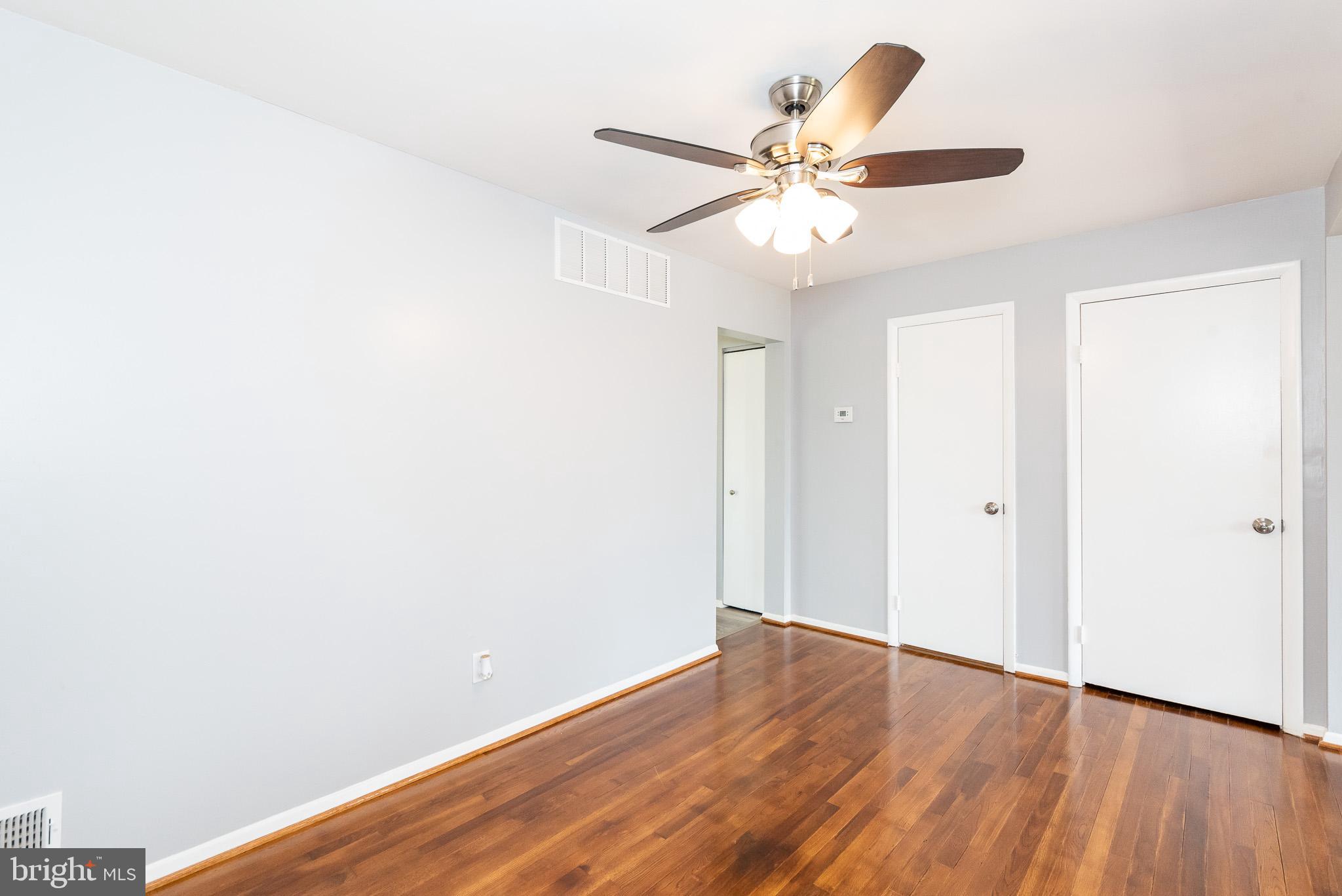 37 Cardor Court, Unit 37 Baltimore, MD 21236 - Photo 8 of 47 a view of an empty room with wooden floor