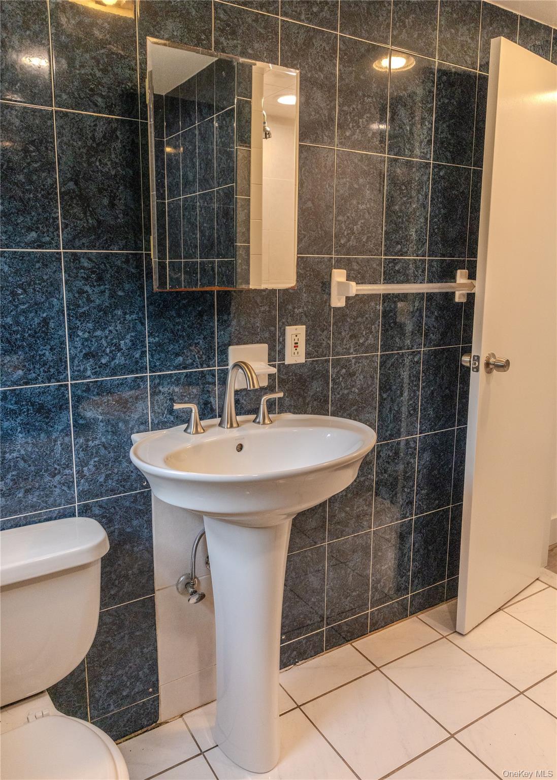 23 Lucille Road Carmel, NY 10512 - Photo 22 of 44 a bathroom with a sink toilet and shower
