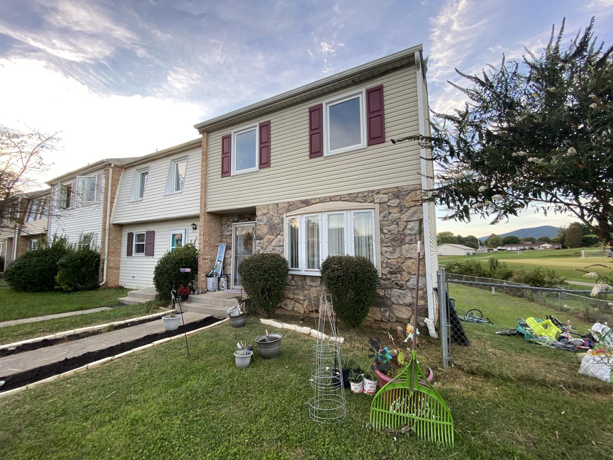2312 Ranch Road Northwest Roanoke, VA 24017 - Photo 2 of 27 a house view with a garden space