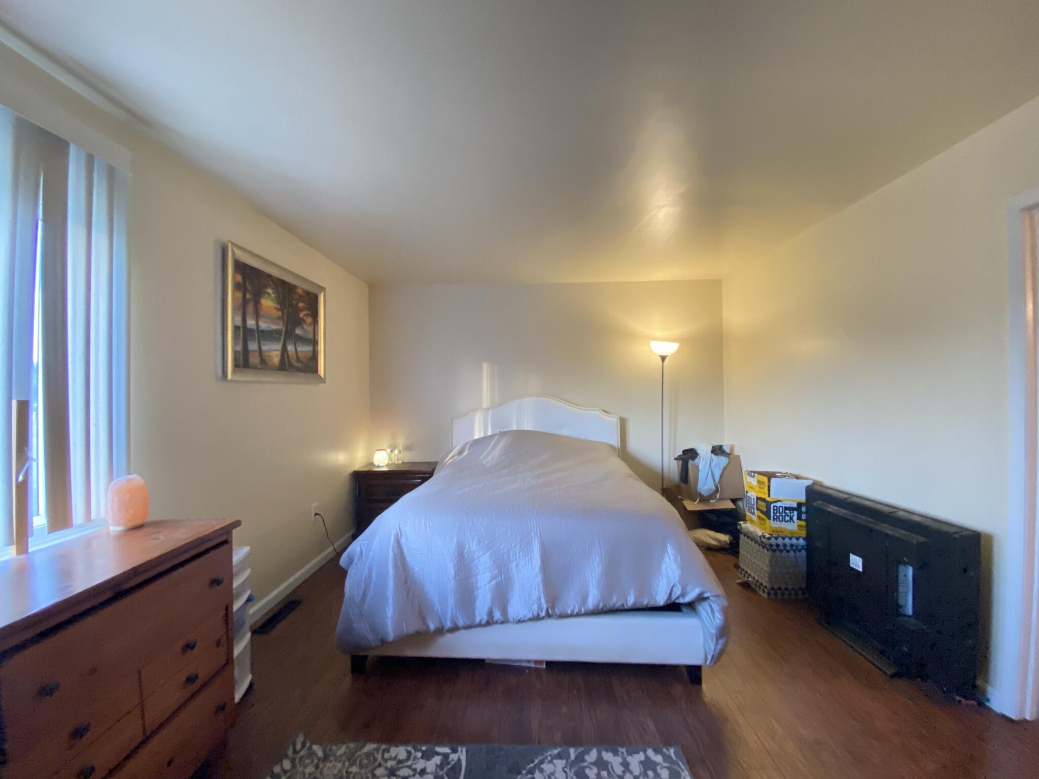 2312 Ranch Road Northwest Roanoke, VA 24017 - Photo 18 of 27 a bedroom with a bed and a night stand