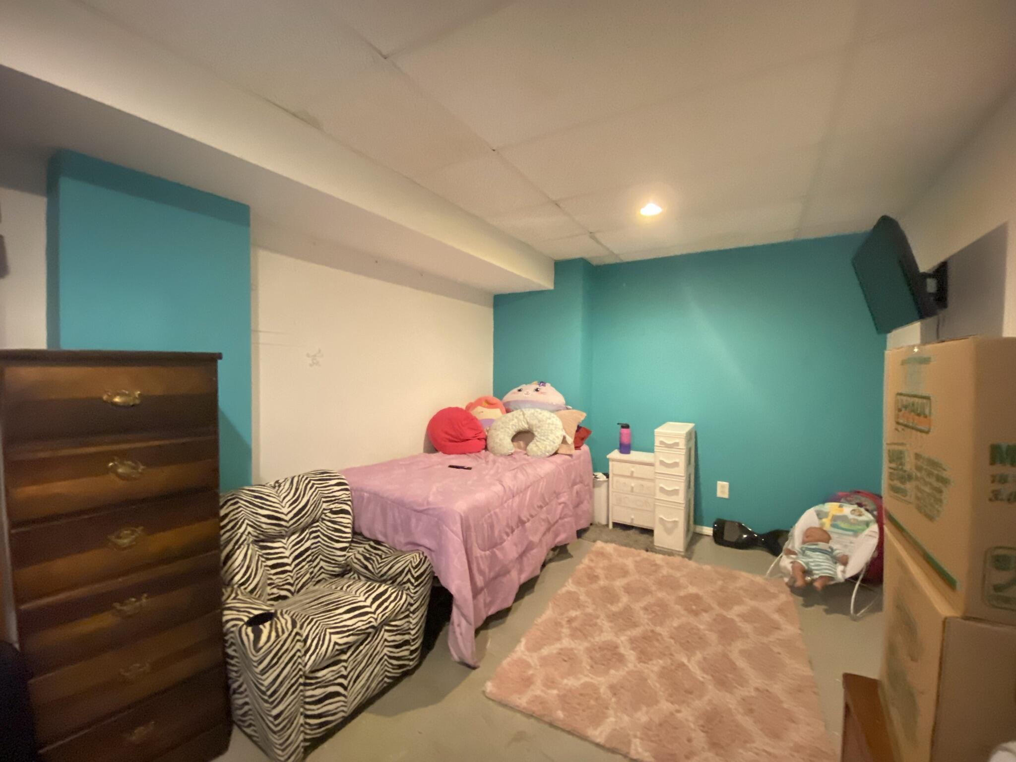 2312 Ranch Road Northwest Roanoke, VA 24017 - Photo 22 of 27 a bedroom with a bed and a dresser
