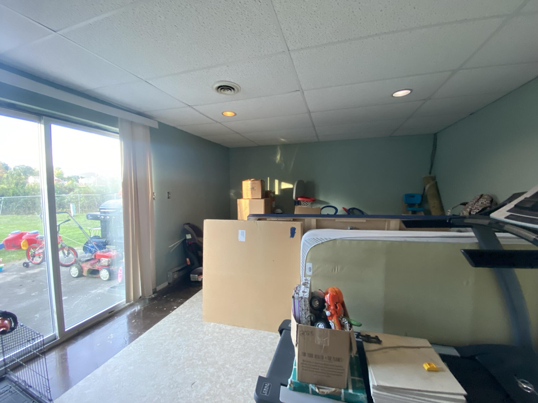 2312 Ranch Road Northwest Roanoke, VA 24017 - Photo 23 of 27 a room with furniture and a window