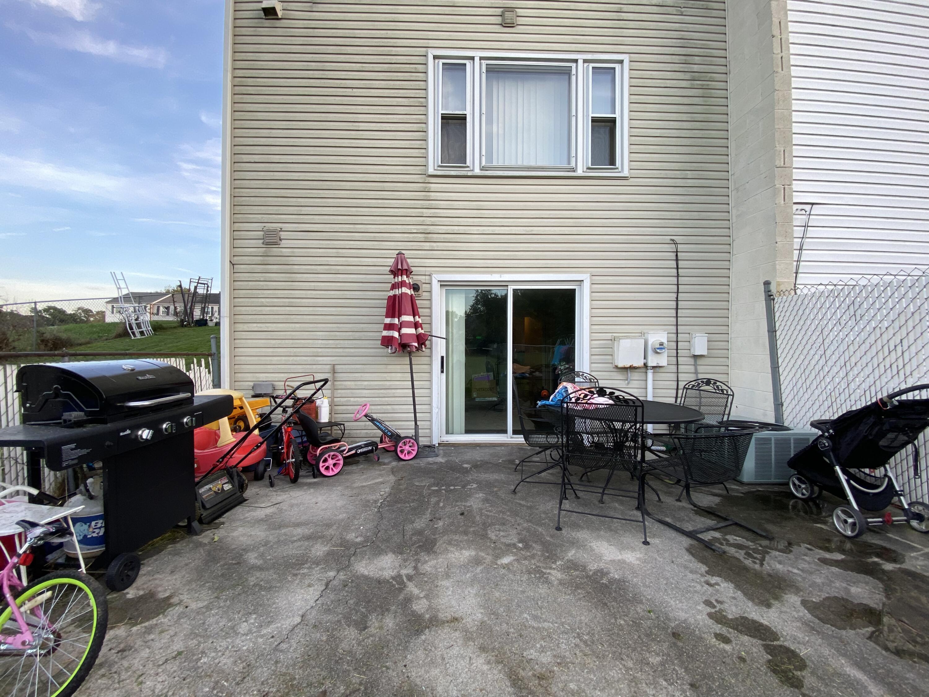 2312 Ranch Road Northwest Roanoke, VA 24017 - Photo 26 of 27 a view of a lounge chairs in the back yard of a house