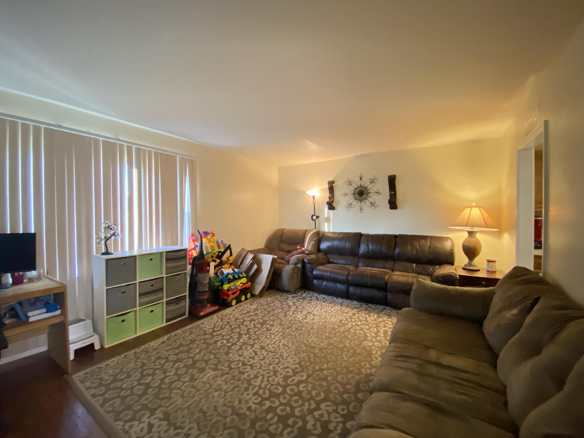 2312 Ranch Road Northwest Roanoke, VA 24017 - Photo 8 of 27 a living room with furniture and a flat screen tv