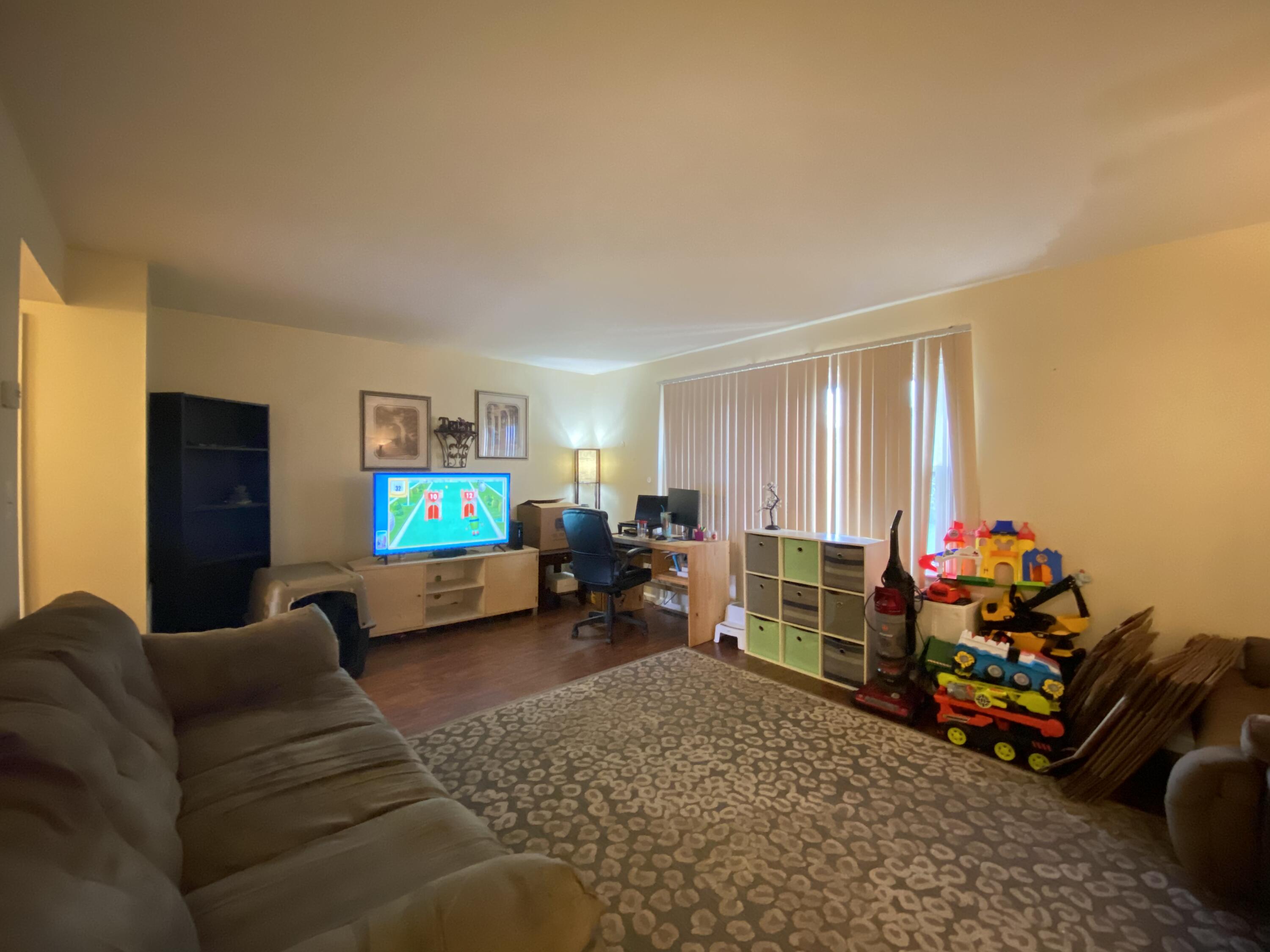2312 Ranch Road Northwest Roanoke, VA 24017 - Photo 10 of 27 a living room with furniture and a flat screen tv