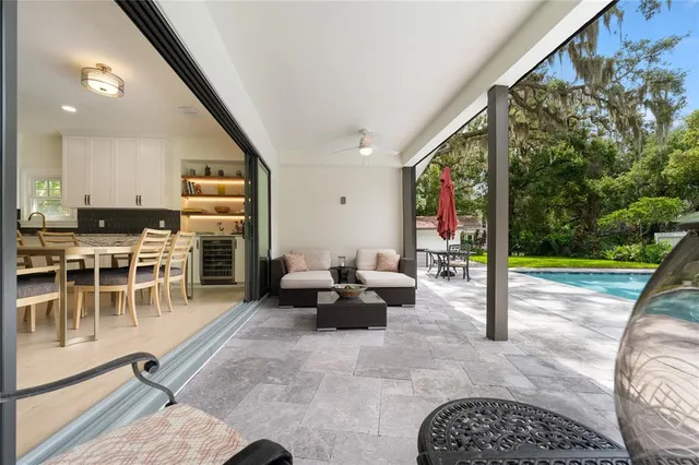 a view of a swimming pool with a patio