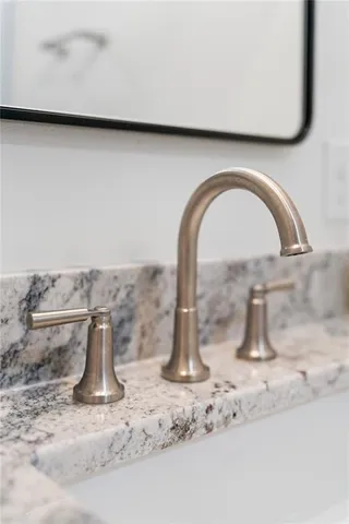 a view of a white house with a big yard and large trees