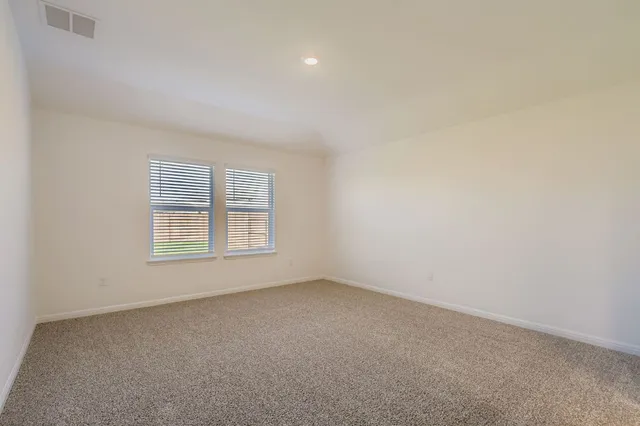 a kitchen with a sink a stove a refrigerator and a microwave