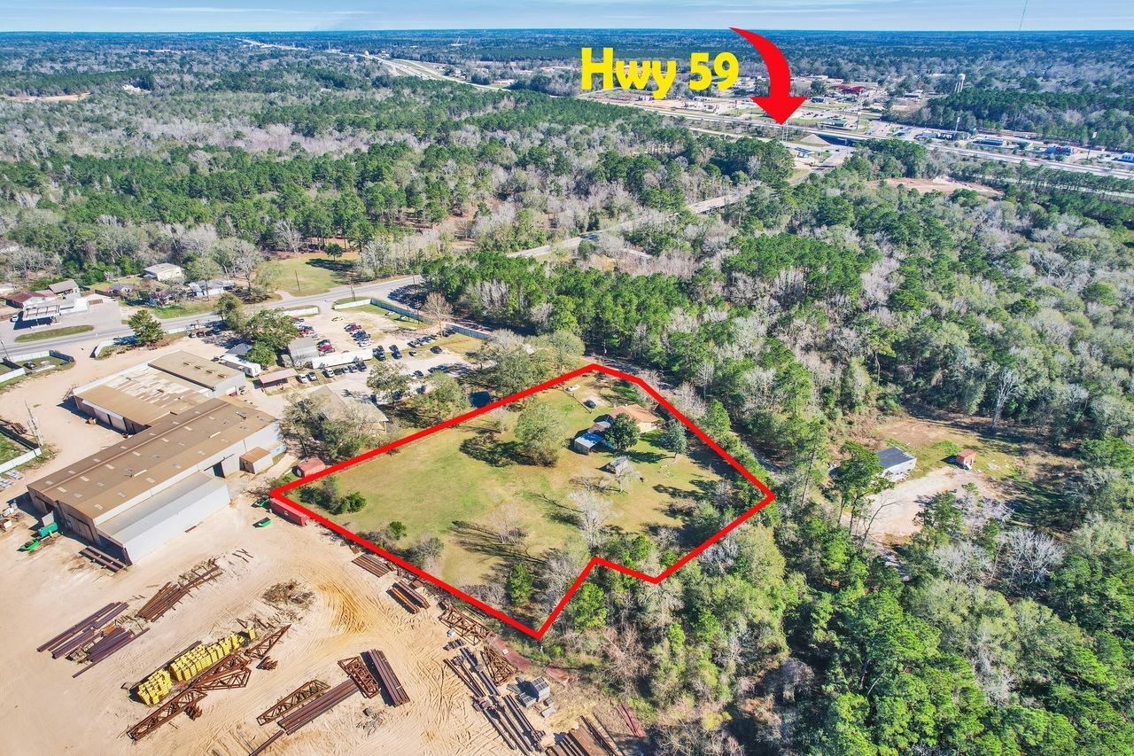 14676 Duke Road Splendora, TX 77372 - Photo 12 of 14 an aerial view of residential houses with outdoor space
