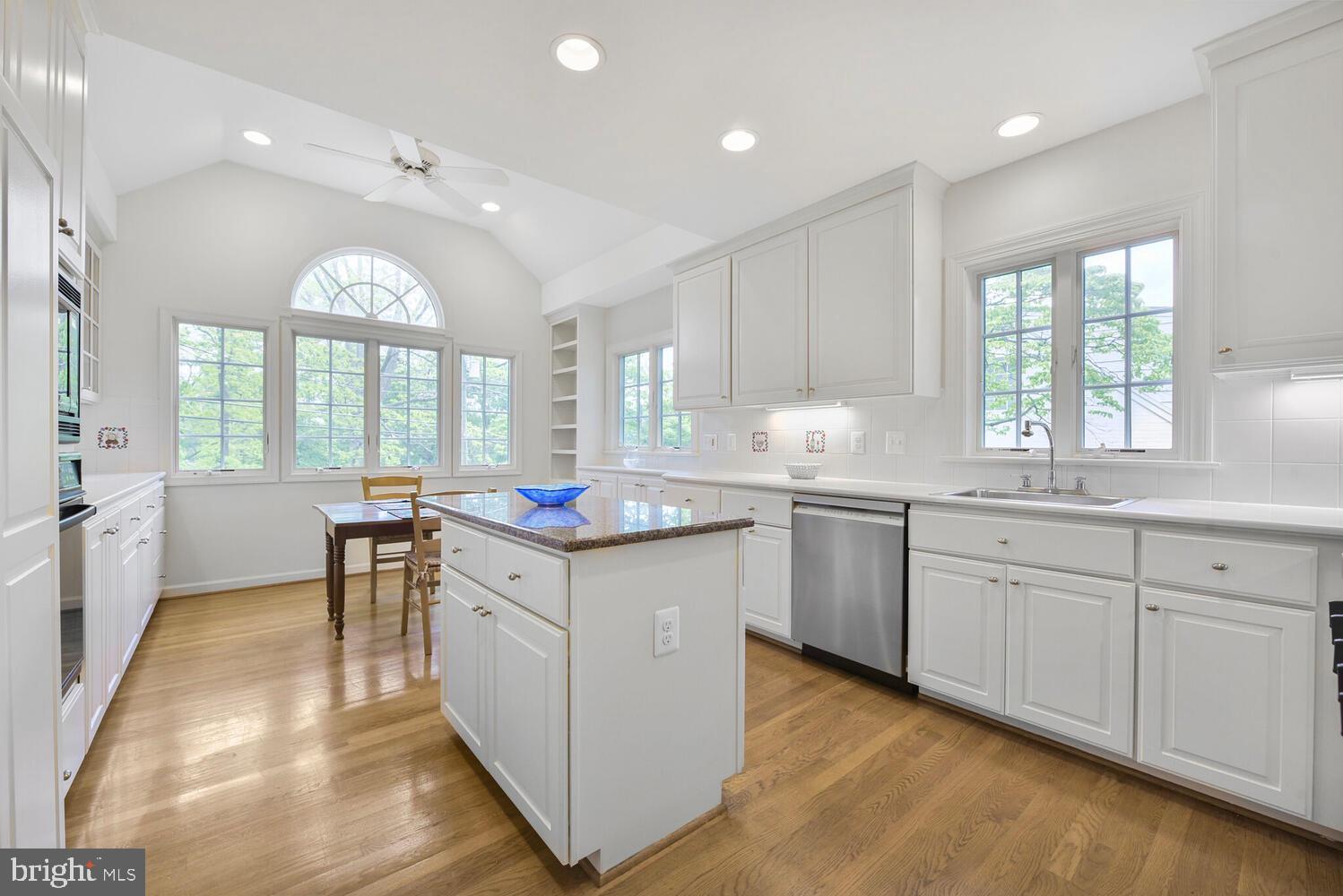 3901 Ridge Road Annandale, VA 22003 - Photo 11 of 21 a kitchen with center island and windows