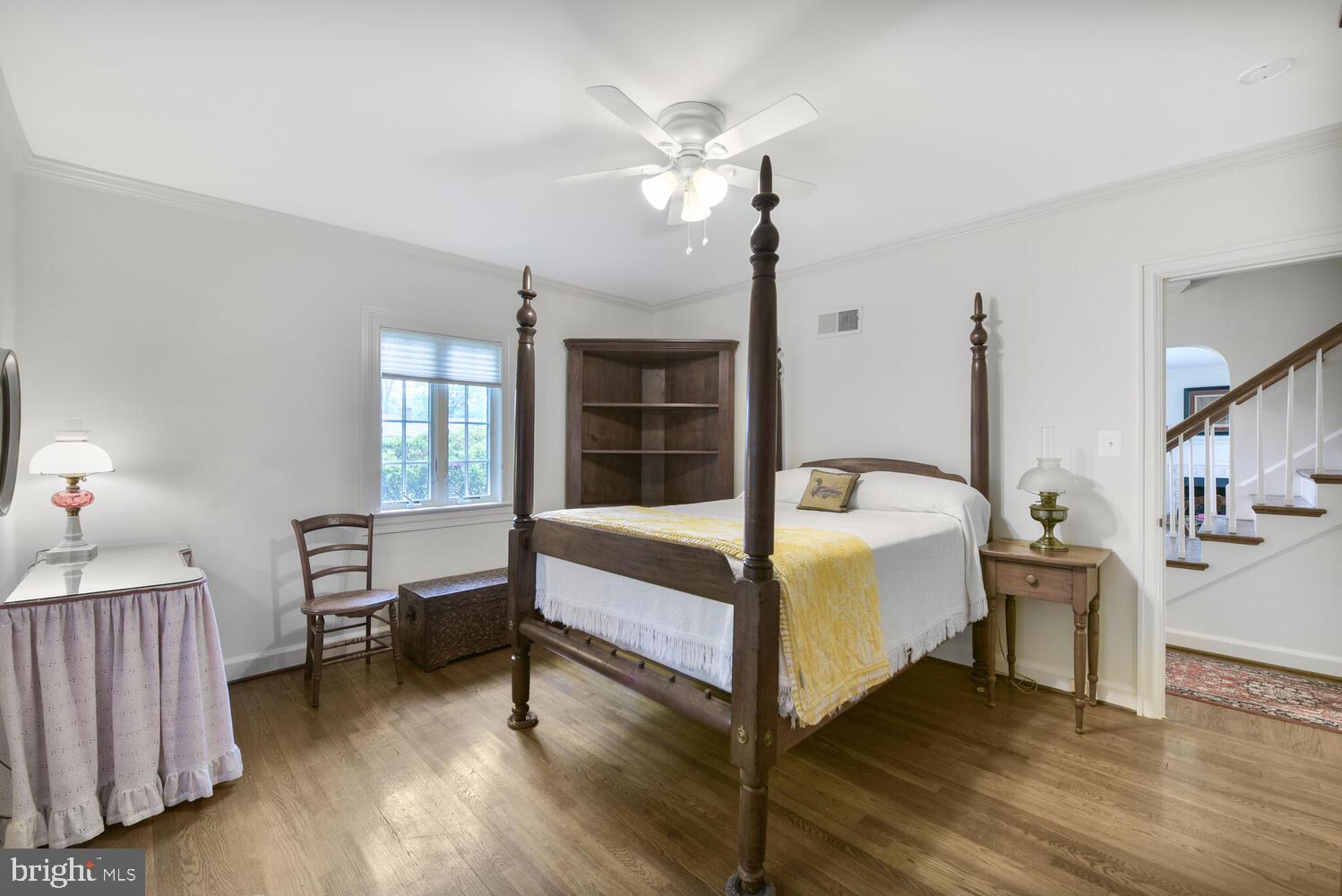 3901 Ridge Road Annandale, VA 22003 - Photo 13 of 21 a bedroom with a bed wooden floor and window