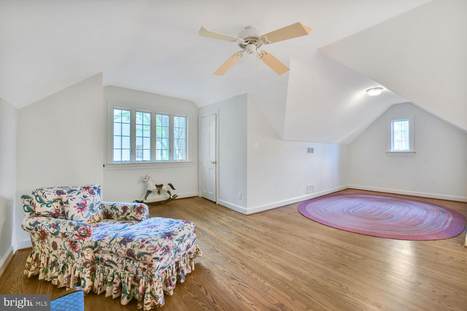 3901 Ridge Road Annandale, VA 22003 - Photo 14 of 21 a bedroom with a bed and a chandelier