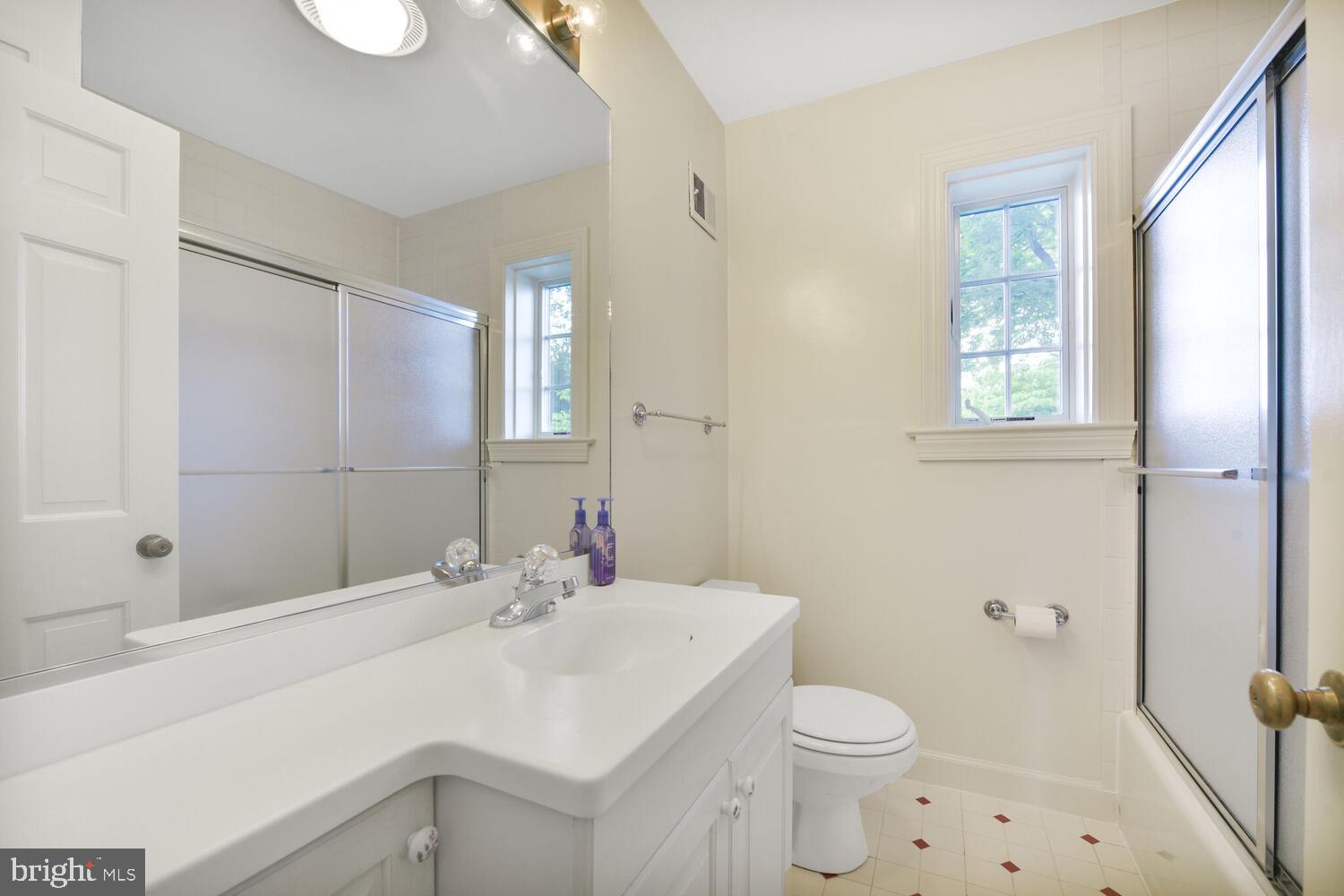 3901 Ridge Road Annandale, VA 22003 - Photo 17 of 21 a bathroom with a sink toilet vanity and shower