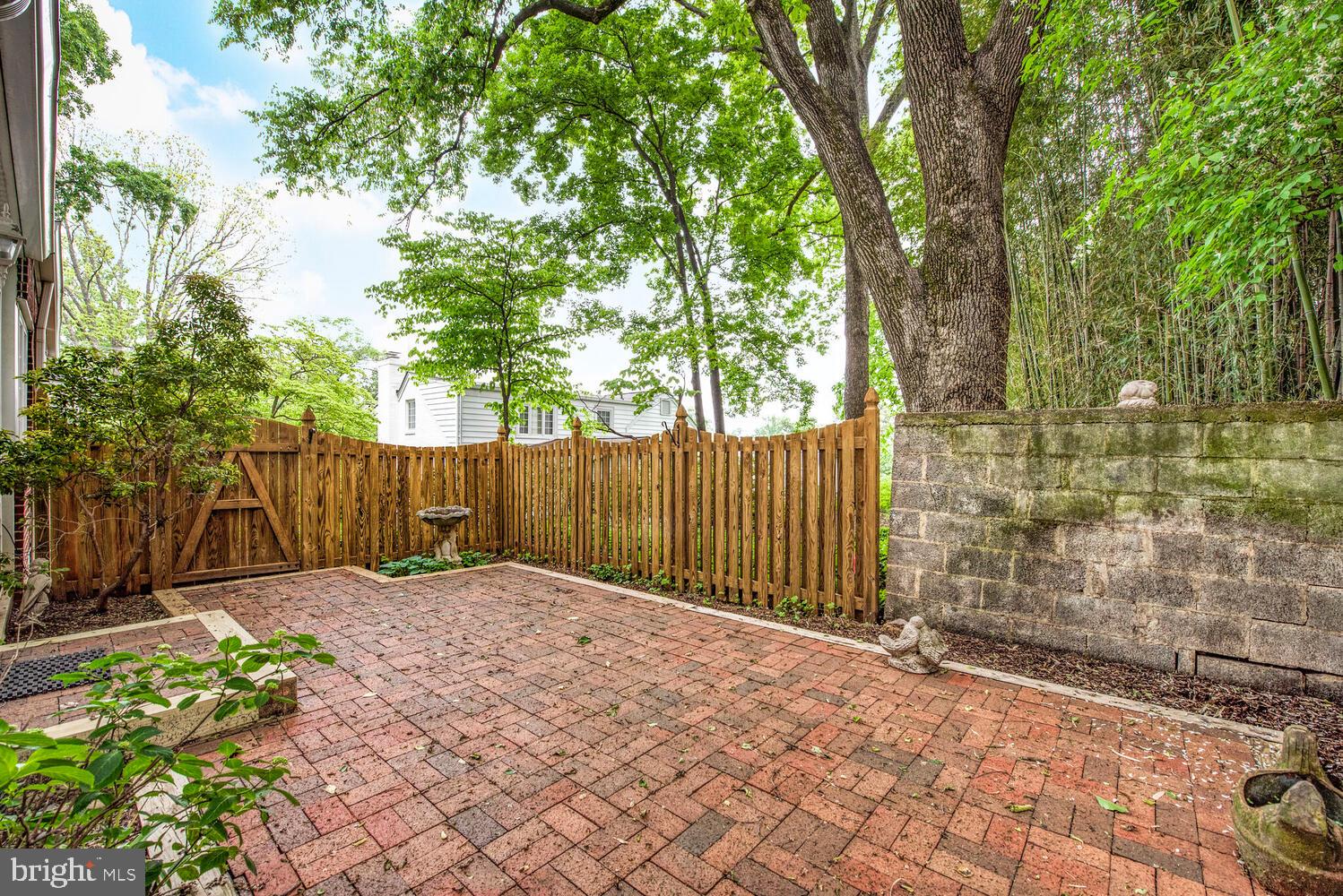 3901 Ridge Road Annandale, VA 22003 - Photo 19 of 21 a view of backyard with wooden fence