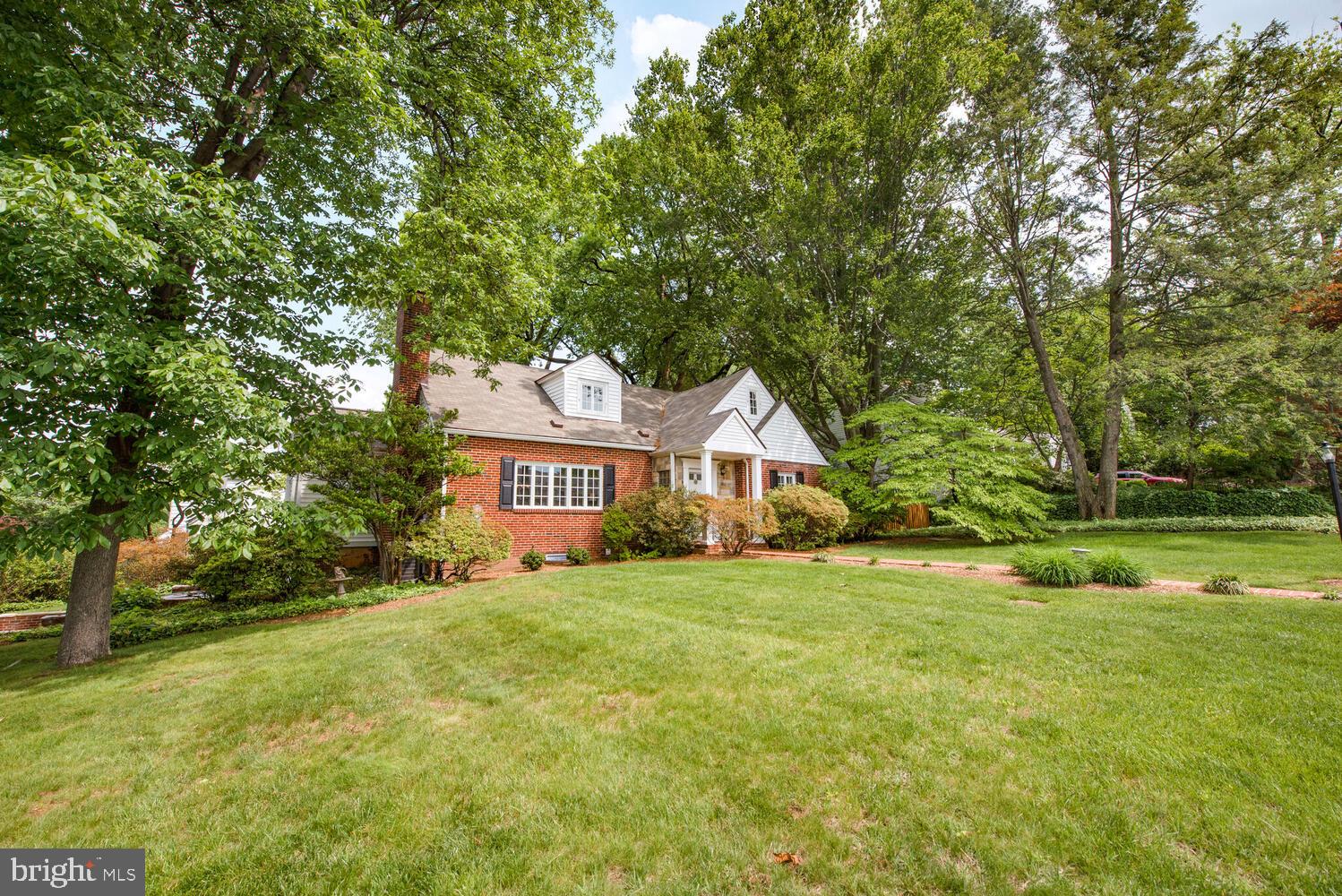 3901 Ridge Road Annandale, VA 22003 - Photo 20 of 21 a front view of a house with a yard