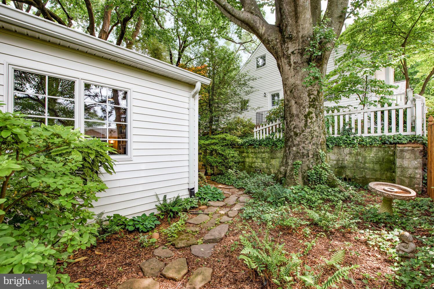 3901 Ridge Road Annandale, VA 22003 - Photo 21 of 21 a view of a house with a yard and plants