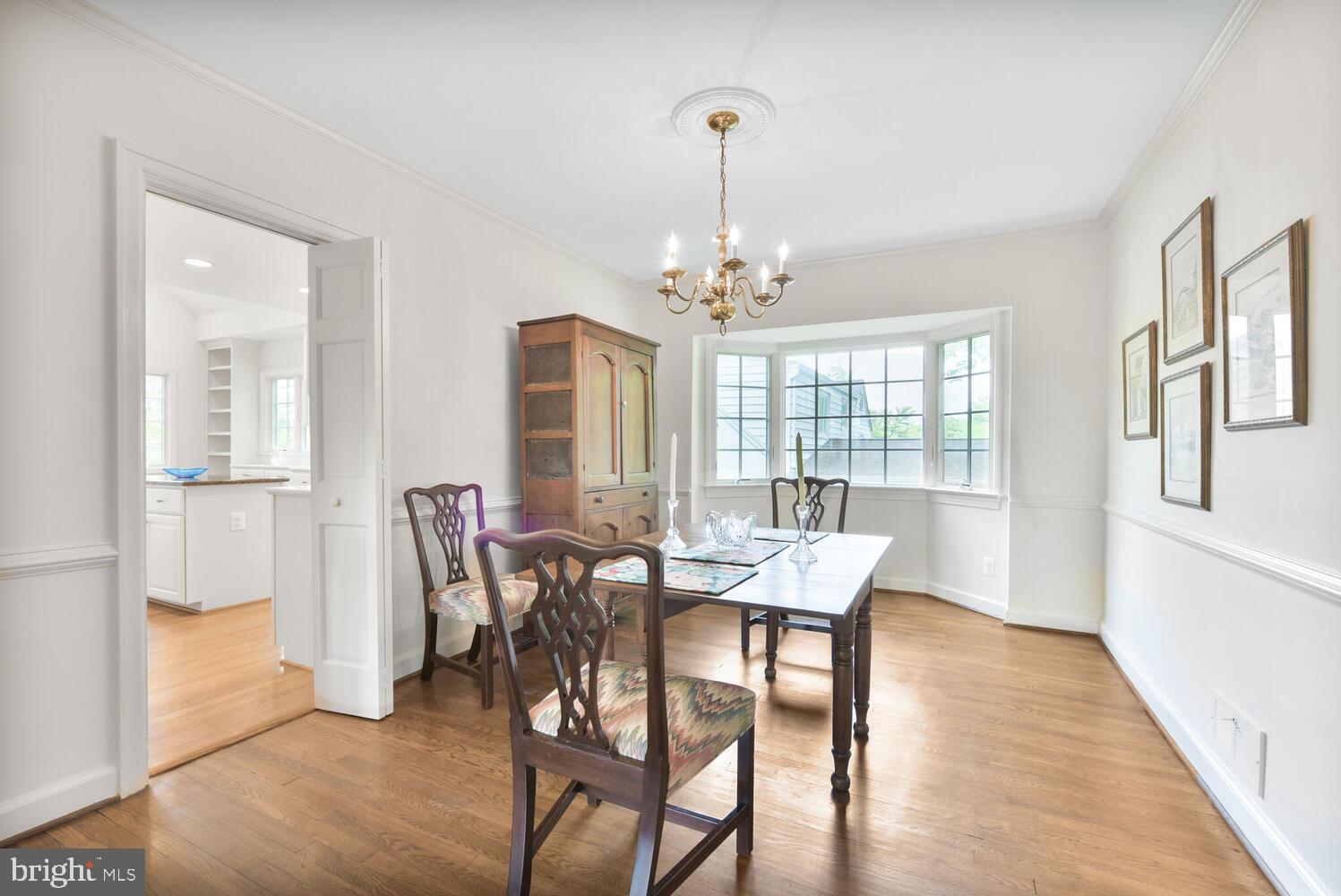 3901 Ridge Road Annandale, VA 22003 - Photo 9 of 21 a view of a dining room with furniture wooden floor and chandelier