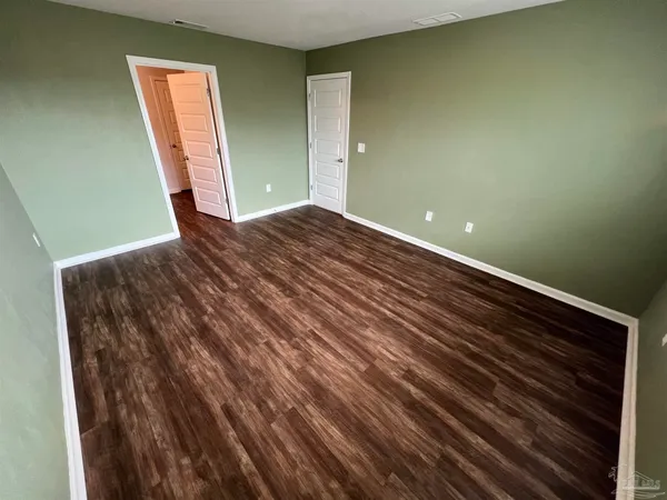 a view of room with window and stairs
