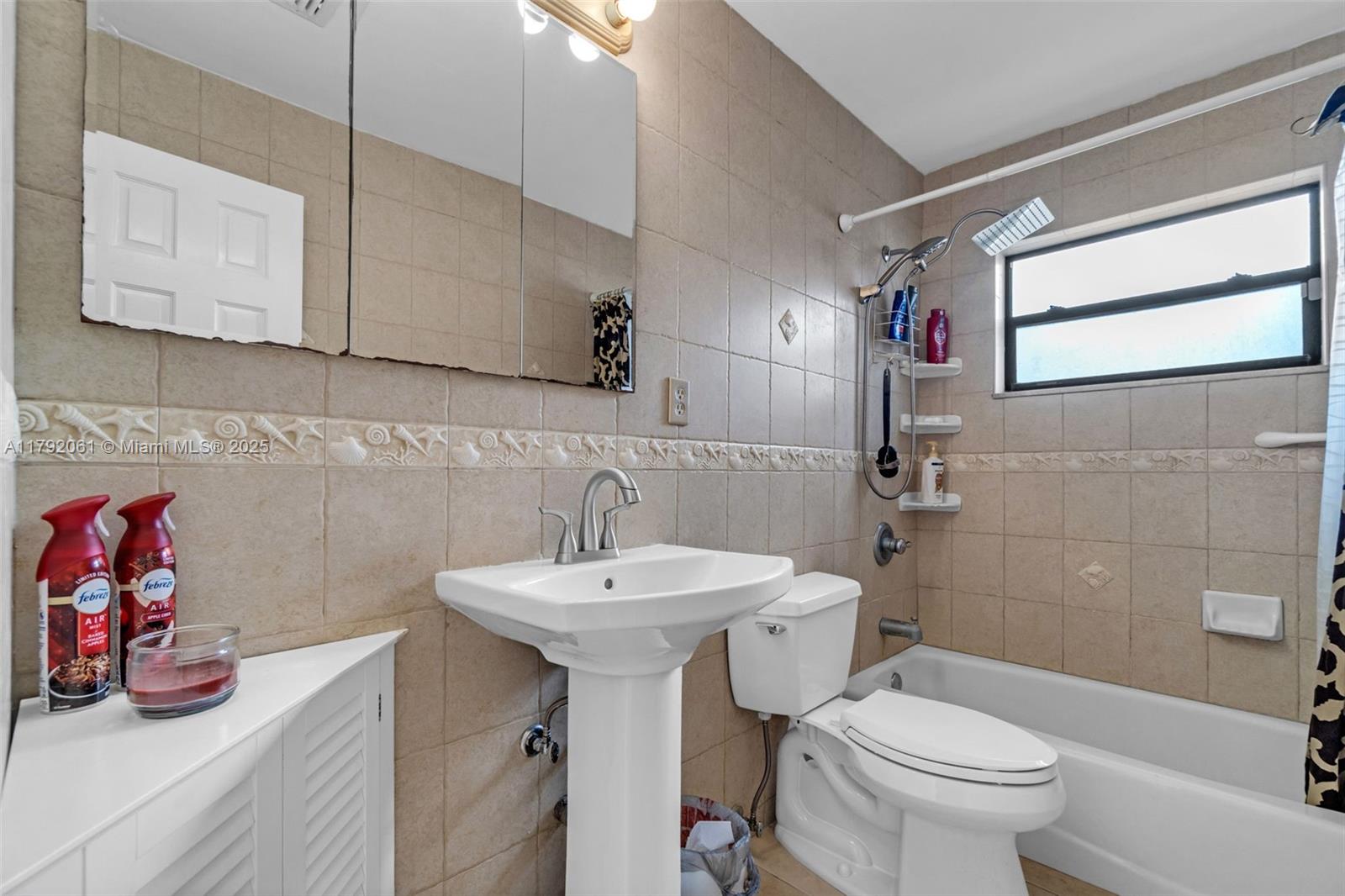 30021 Southwest 160th Avenue Homestead, FL 33033 - Photo 20 of 55 a bathroom with a sink toilet and a shower