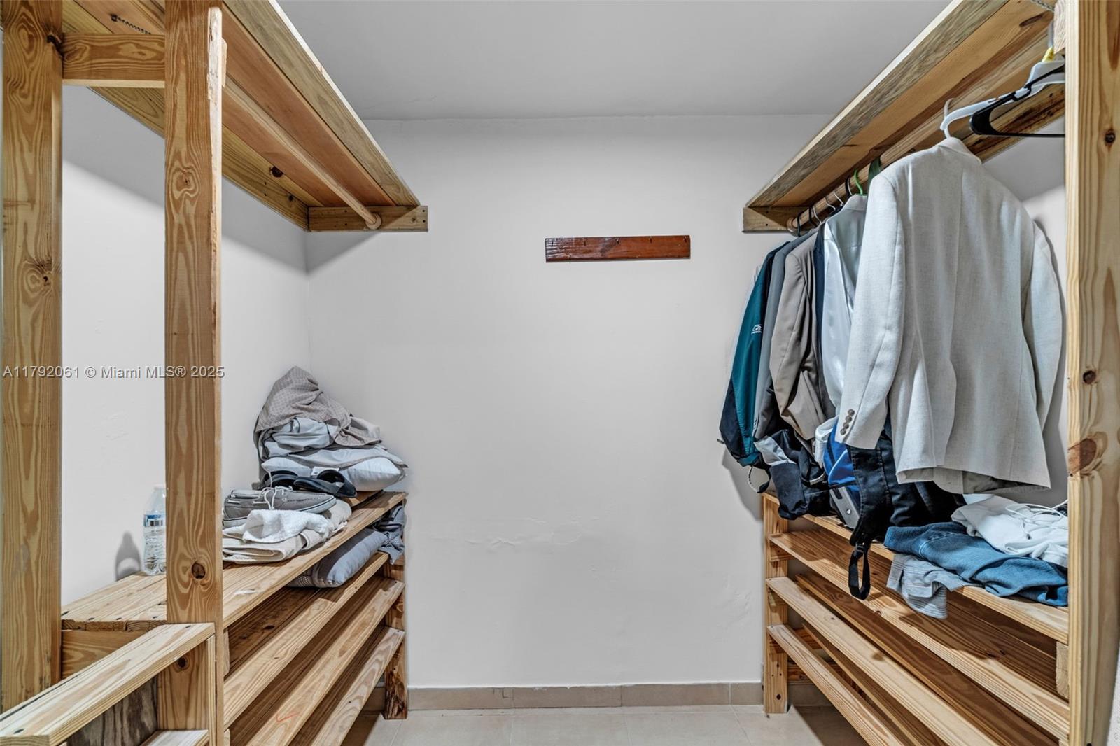 30021 Southwest 160th Avenue Homestead, FL 33033 - Photo 32 of 55 a view of a closet with storage