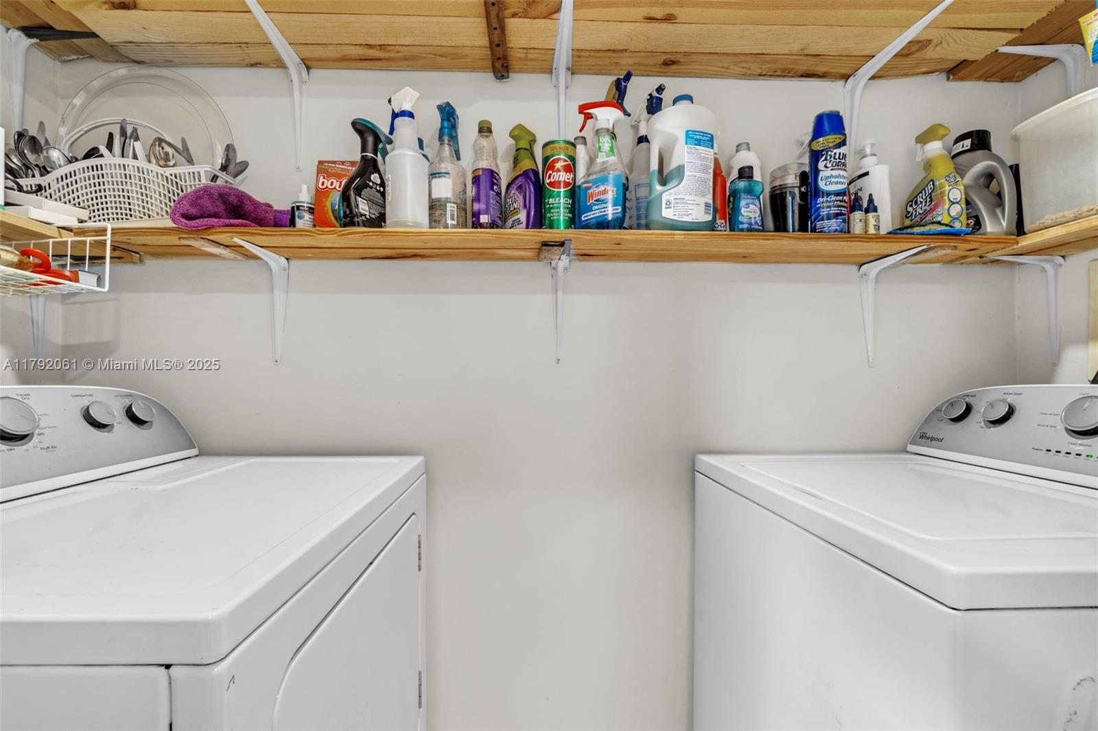 30021 Southwest 160th Avenue Homestead, FL 33033 - Photo 38 of 55 a view of storage and utility room with washer and dryer
