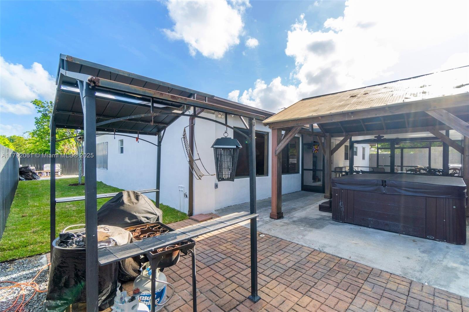 30021 Southwest 160th Avenue Homestead, FL 33033 - Photo 42 of 55 a house view with a backyard space