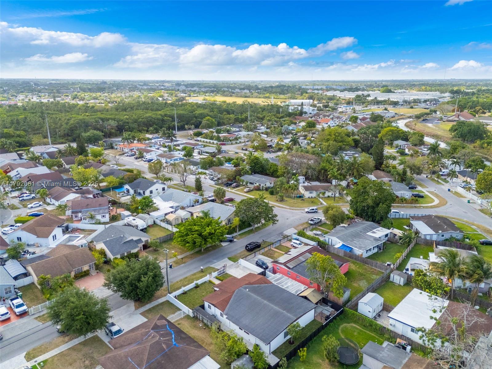 30021 Southwest 160th Avenue Homestead, FL 33033 - Photo 47 of 55 an aerial view of a city