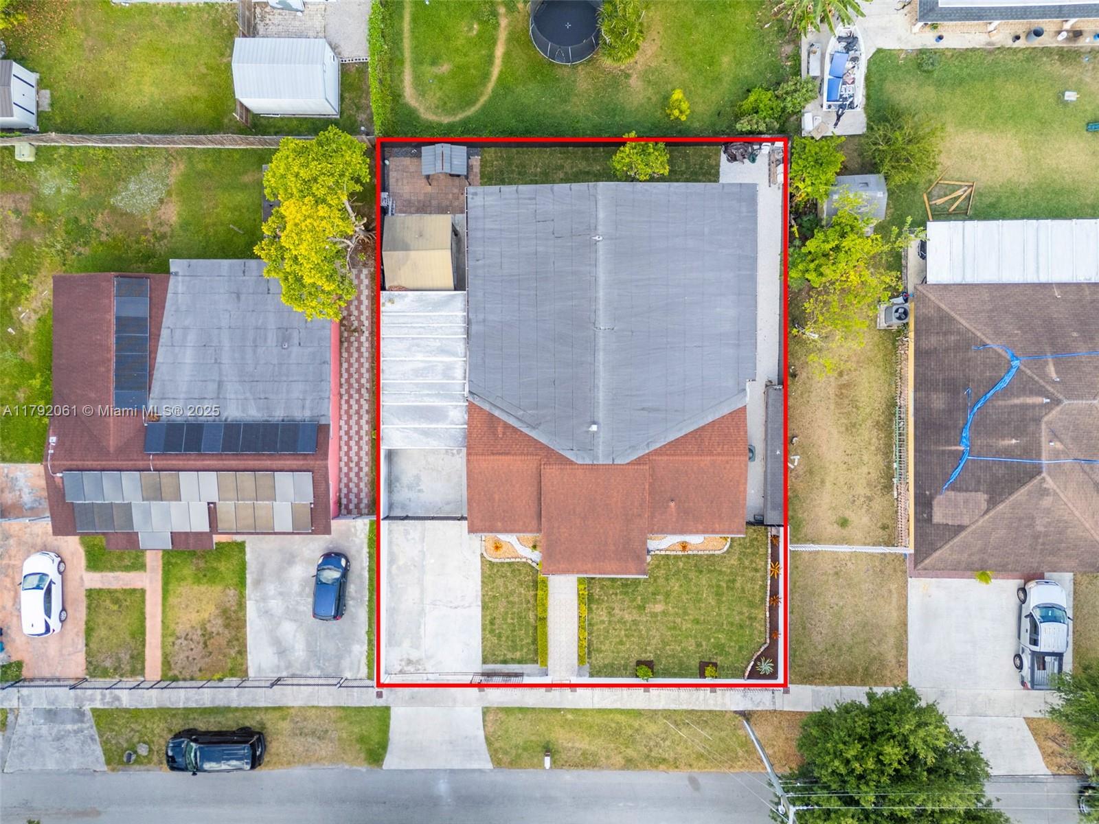 30021 Southwest 160th Avenue Homestead, FL 33033 - Photo 54 of 55 an aerial view of residential houses with outdoor space and street view