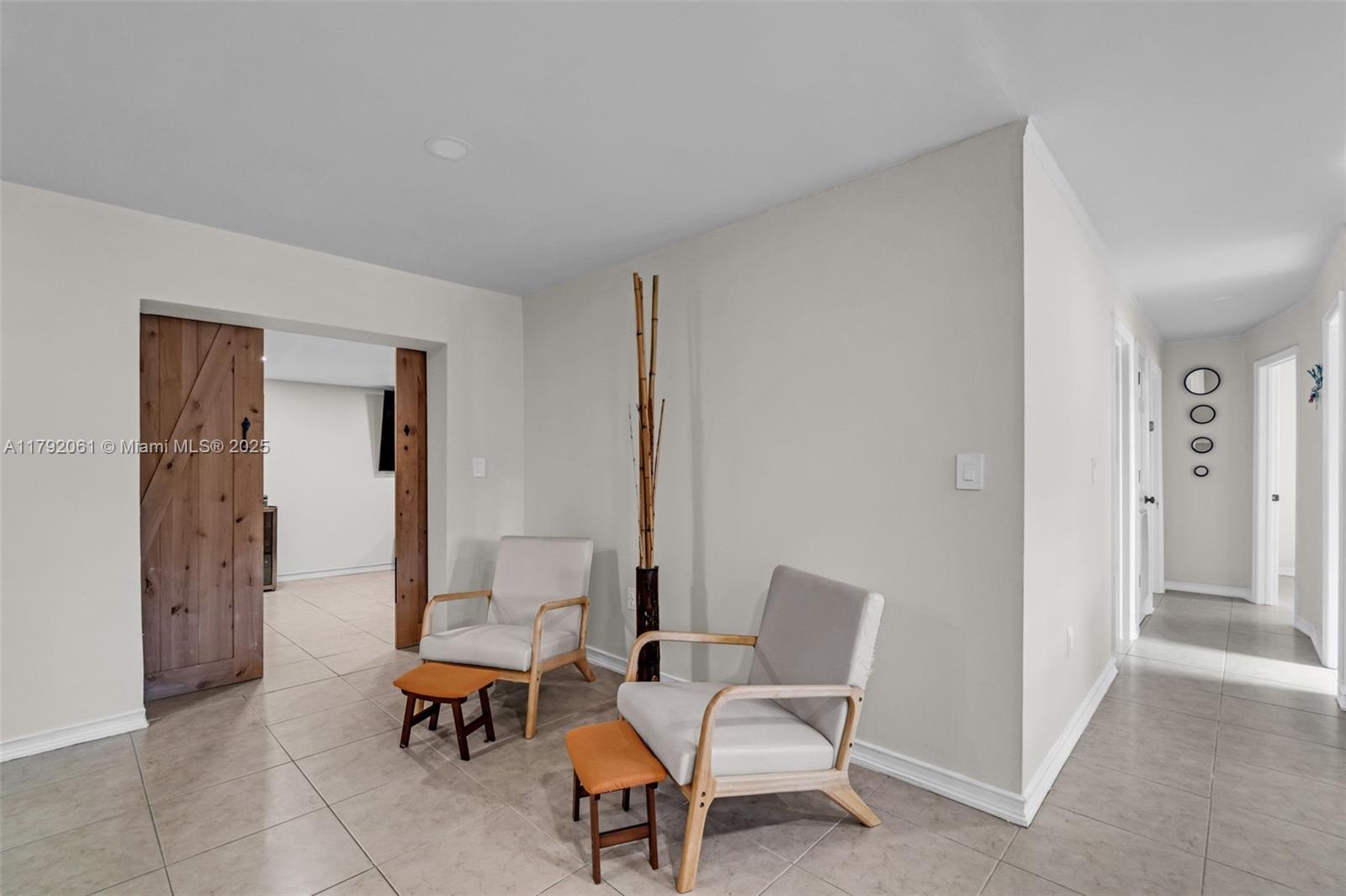 30021 Southwest 160th Avenue Homestead, FL 33033 - Photo 7 of 55 a living room with furniture and a window
