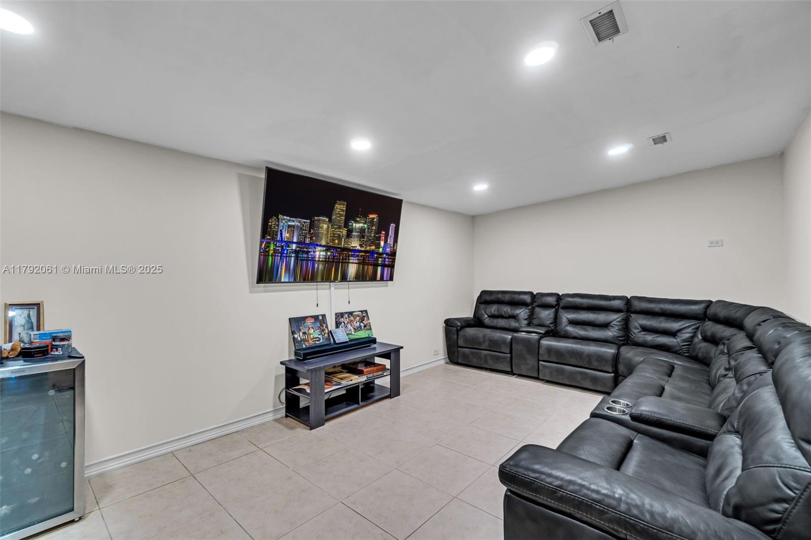 30021 Southwest 160th Avenue Homestead, FL 33033 - Photo 8 of 55 a living room with furniture