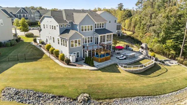 a view of a brick house with large windows