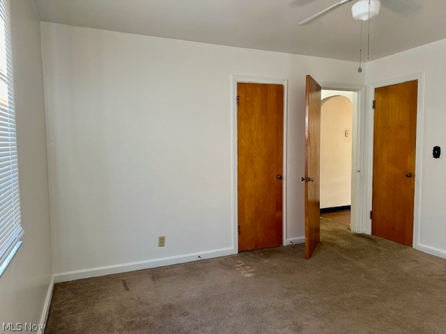 751 Thayer Street, Unit DOWN Akron, OH 44310 - Photo 12 of 25 Carpeted empty room with ceiling fan