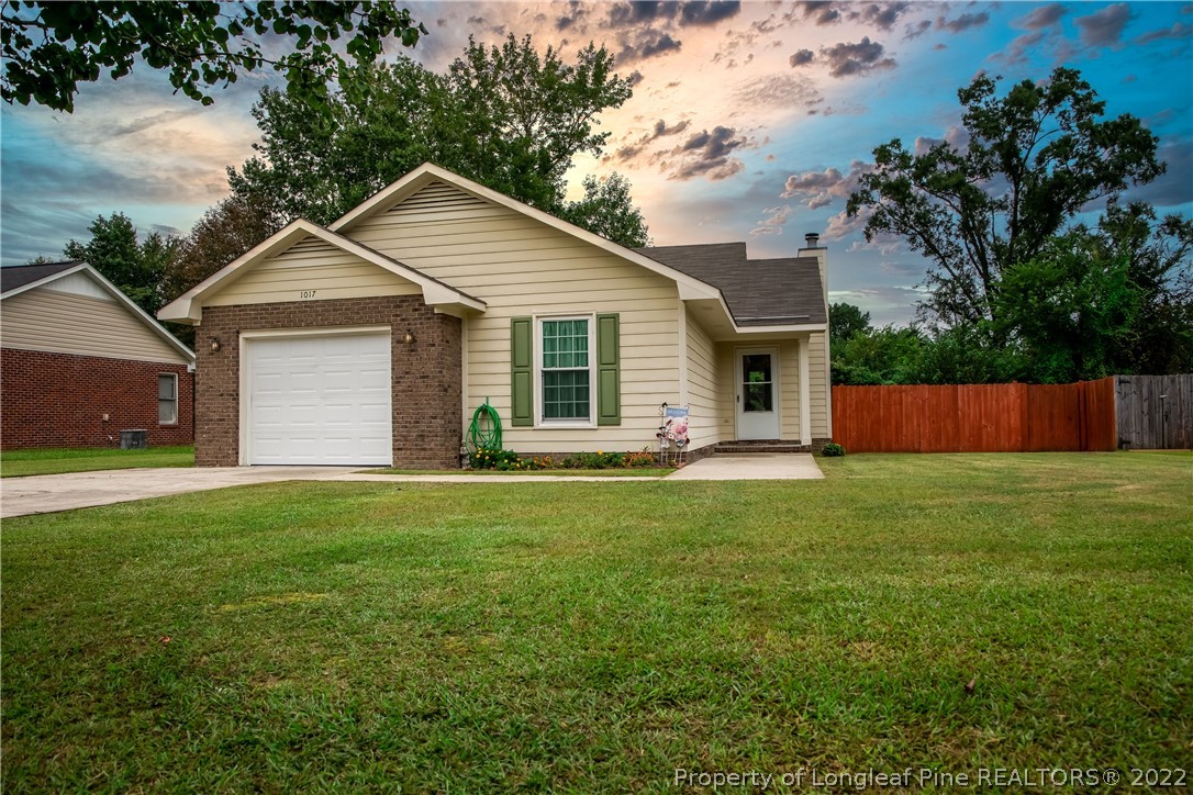 1017 Locks Creek Road Fayetteville, NC 28312 - Photo 1 of 26 a view of a yard in front of house