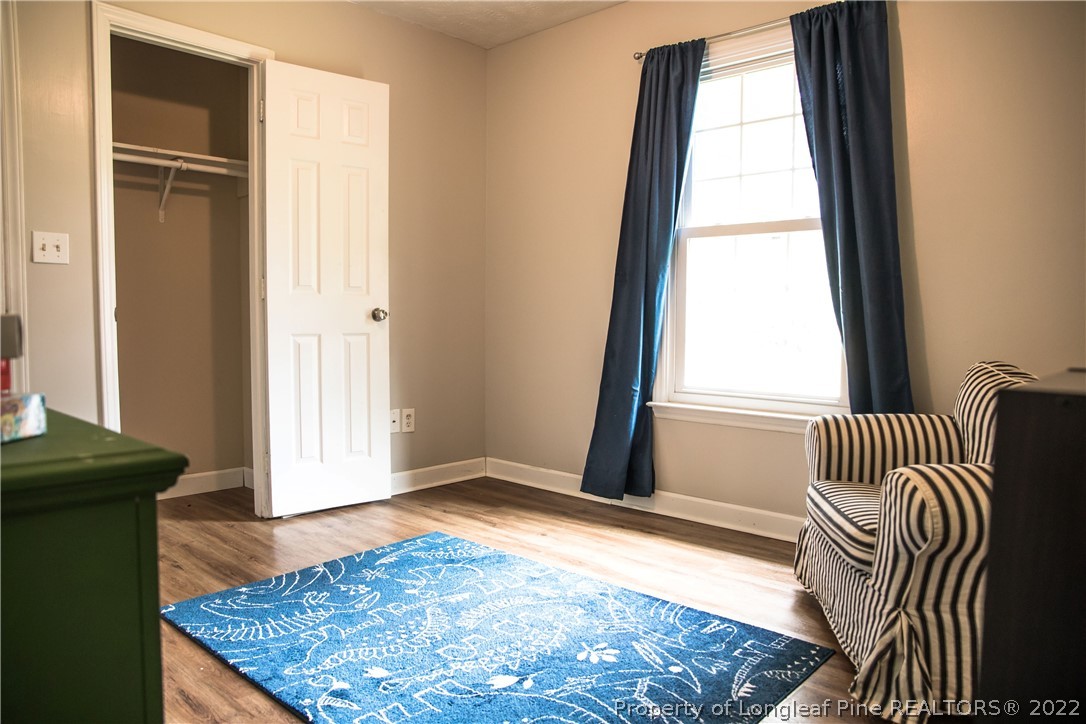 1017 Locks Creek Road Fayetteville, NC 28312 - Photo 12 of 26 wooden floor and window in a room