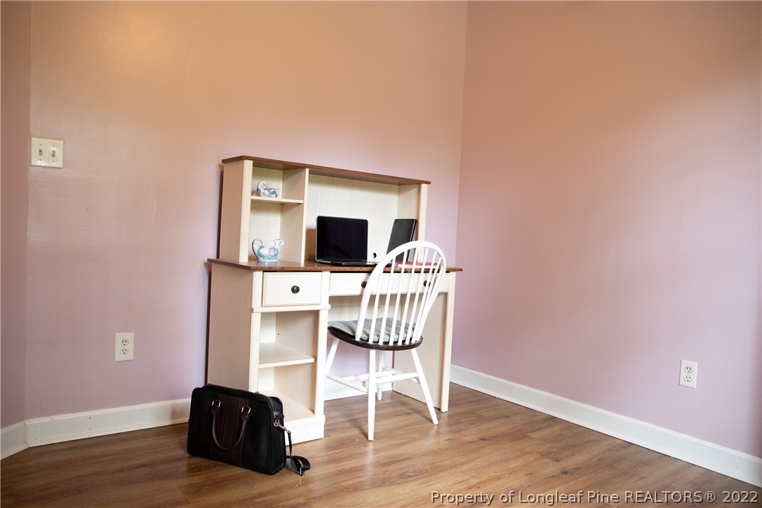 1017 Locks Creek Road Fayetteville, NC 28312 - Photo 14 of 26 a living room with furniture and a flat screen tv