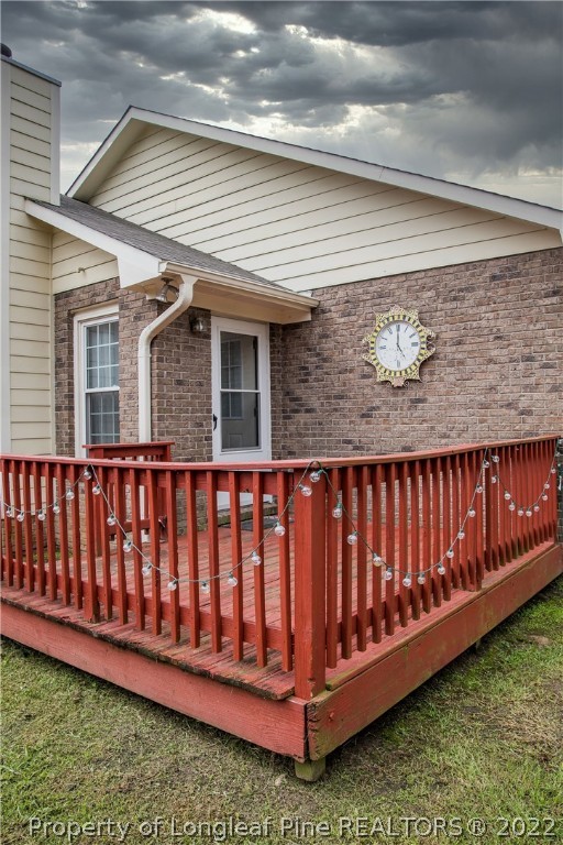 1017 Locks Creek Road Fayetteville, NC 28312 - Photo 24 of 26 a view of a house with wooden fence